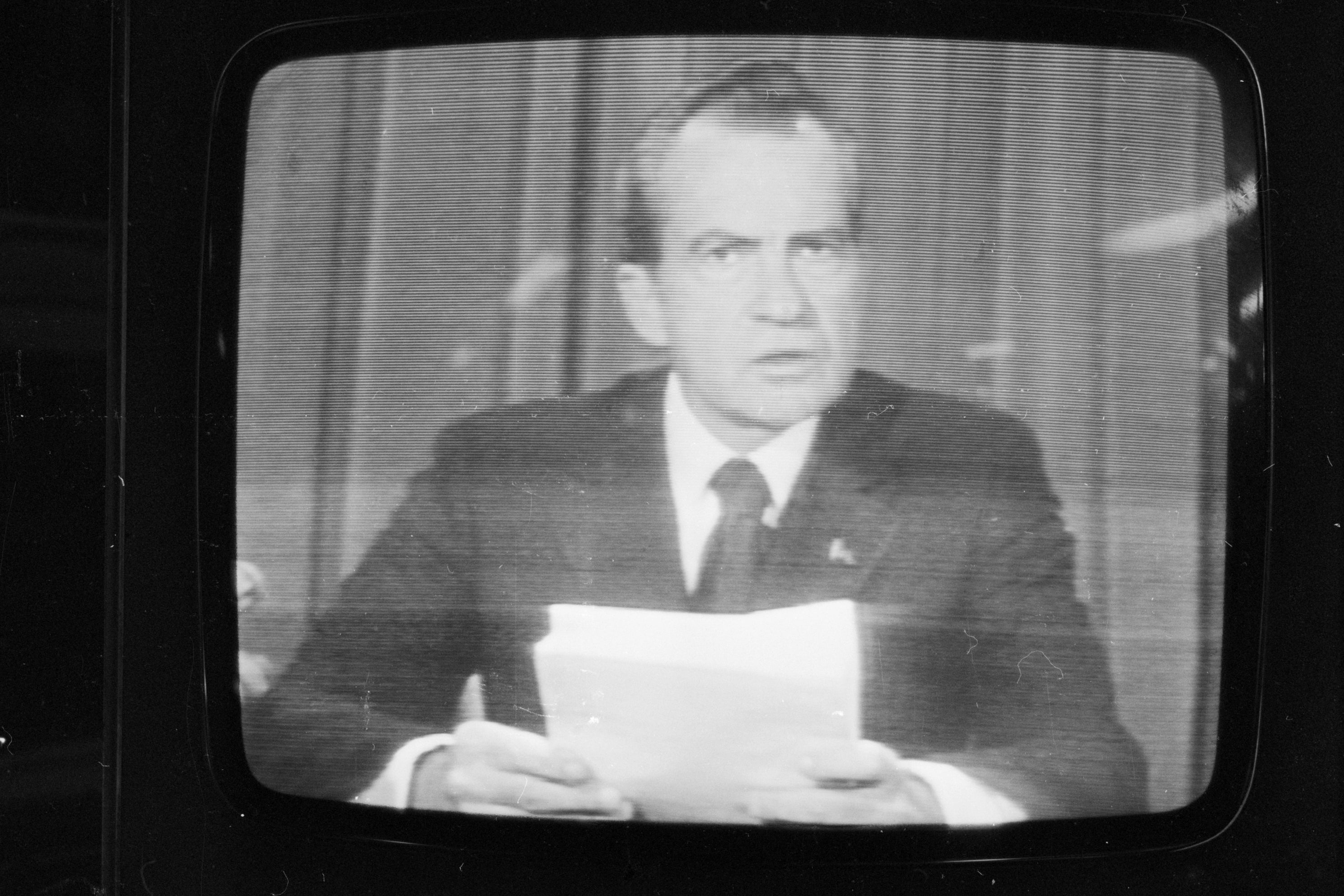 Richard Nixon announces his resignation on national television following the Watergate scandal