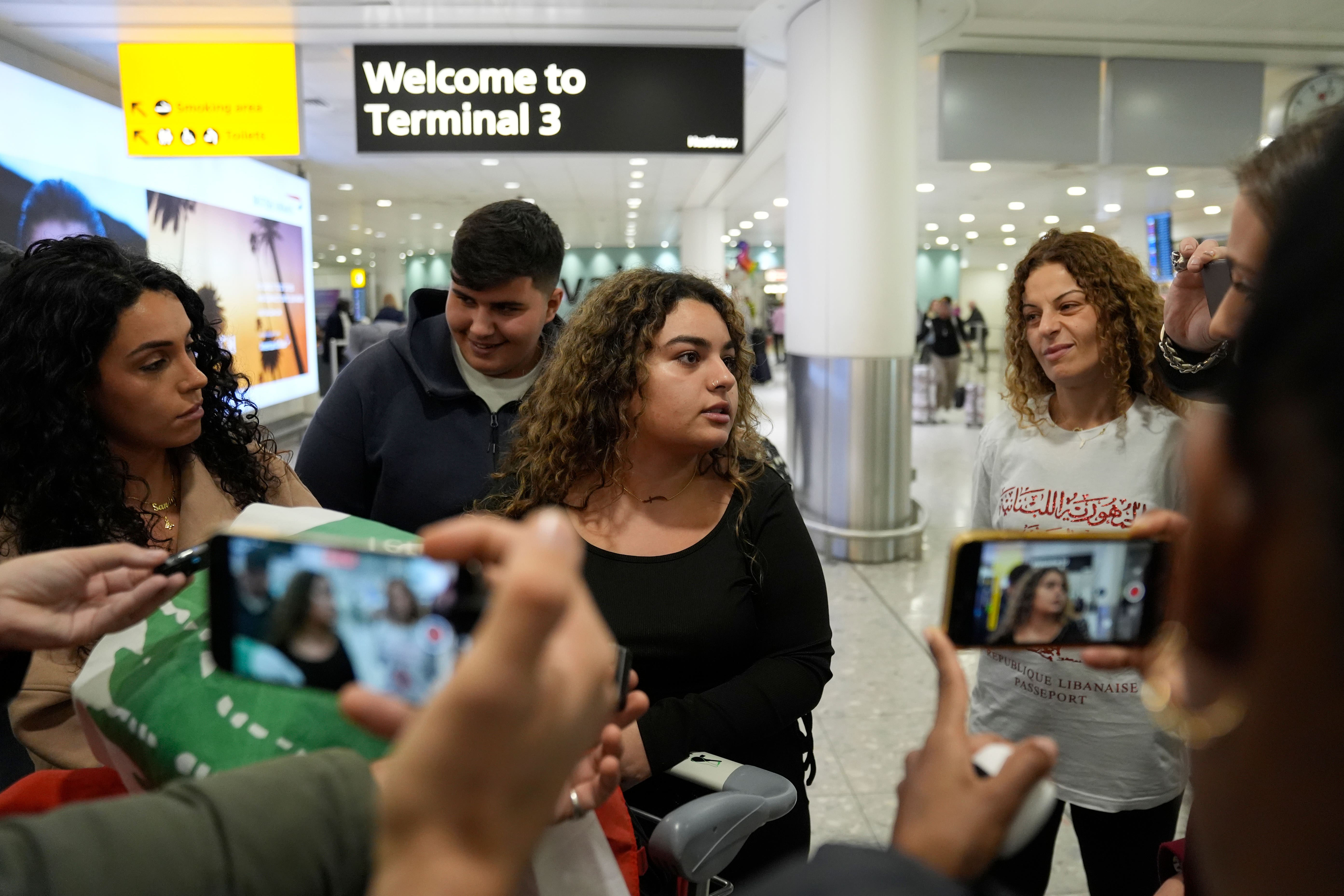 Lara (no surname given) speaks to media at Heathrow Airport after arriving on a flight from Beirut, Lebanon (Andrew Matthews/PA)