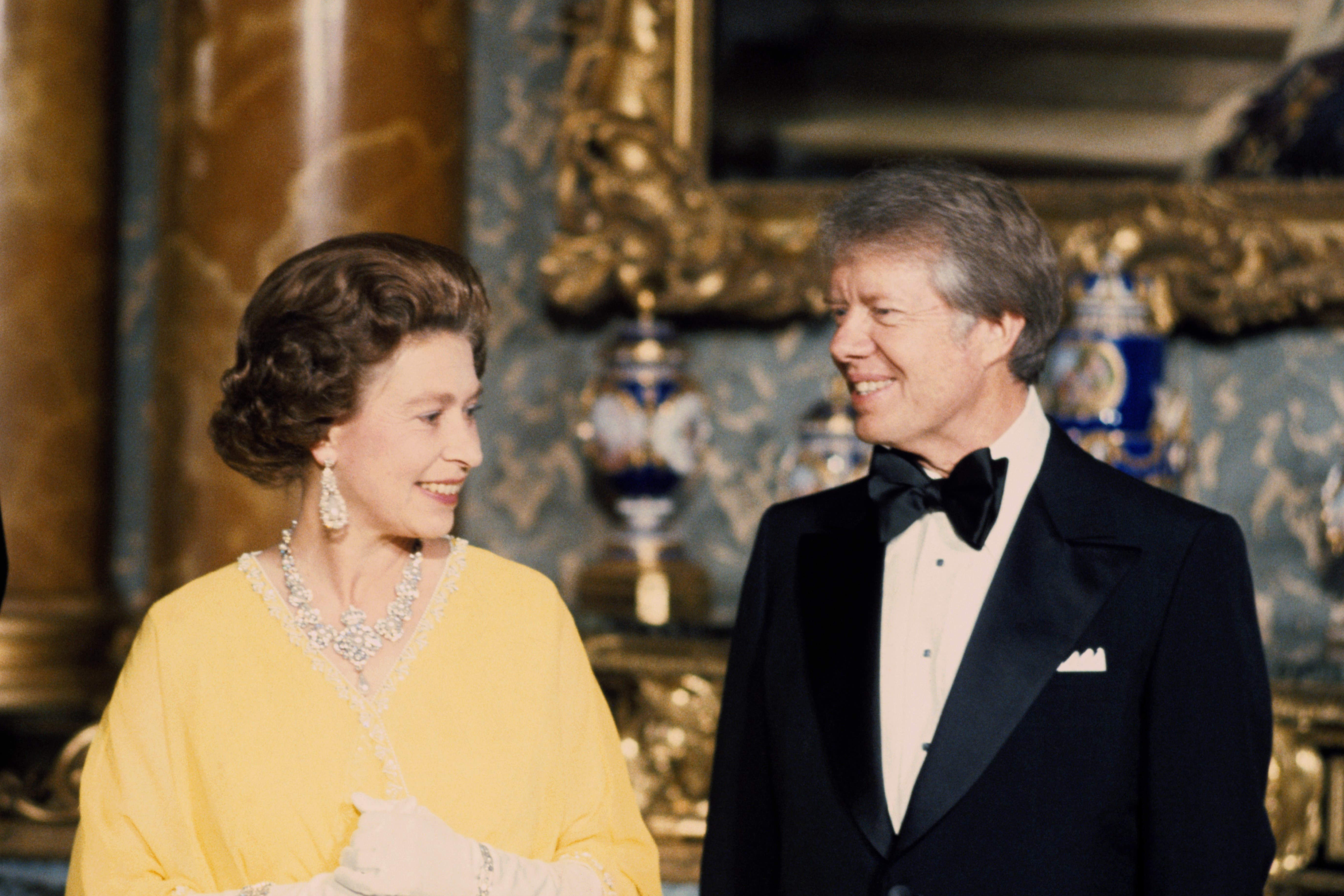 The late Queen with then US president Jimmy Carter at a state dinner at Buckingham Palace in 1977 (PA)