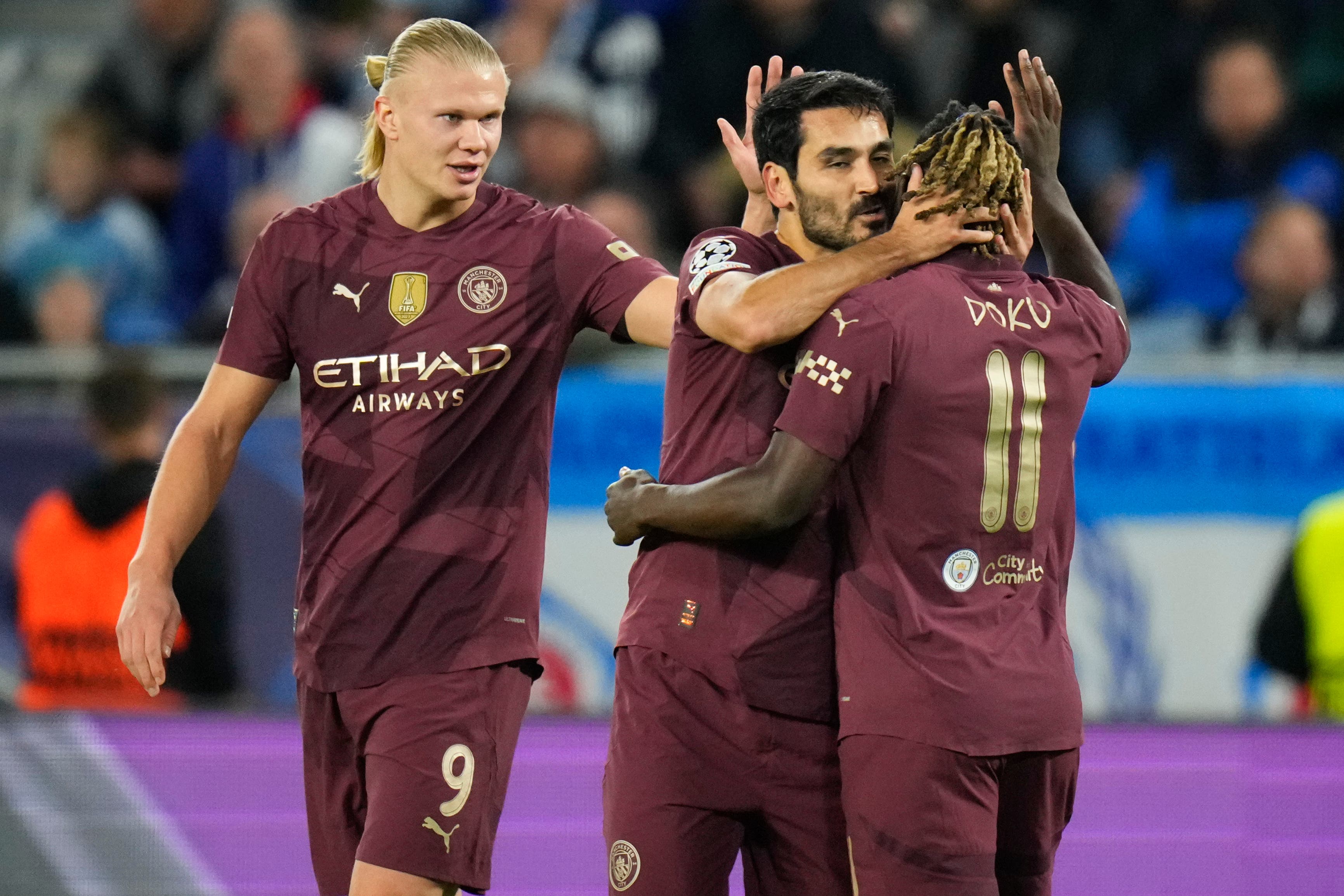 Ilkay Gundogan, centre, celebrates after scoring Manchester City’s opener (Petr Josek/AP)