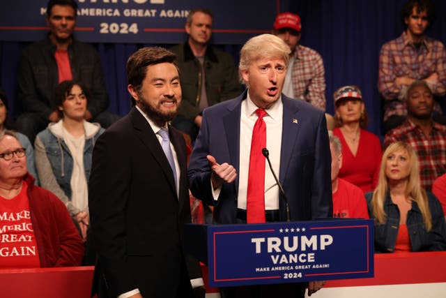 <p>This image released by NBC shows Bowen Yang as JD Vance, left, and James Austin Johnson as Donald Trump, during the cold open sketch on "Saturday Night Live" in New York on Saturday, Sept. 28, 2024</p>