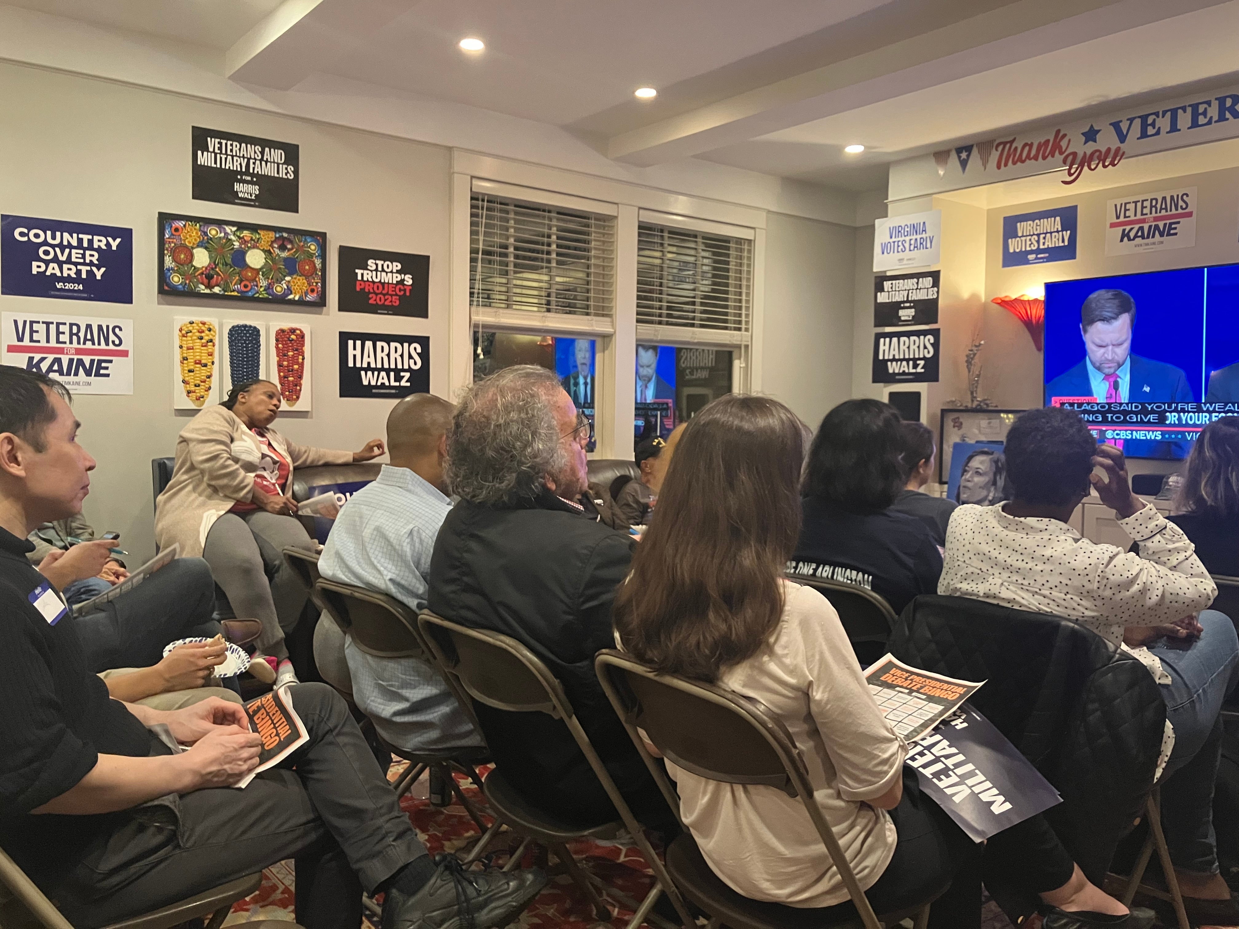 Democrats in Arlington, Virginia, were initially quiet as the debate began but started cheering as Senator JD Vance began to wobble