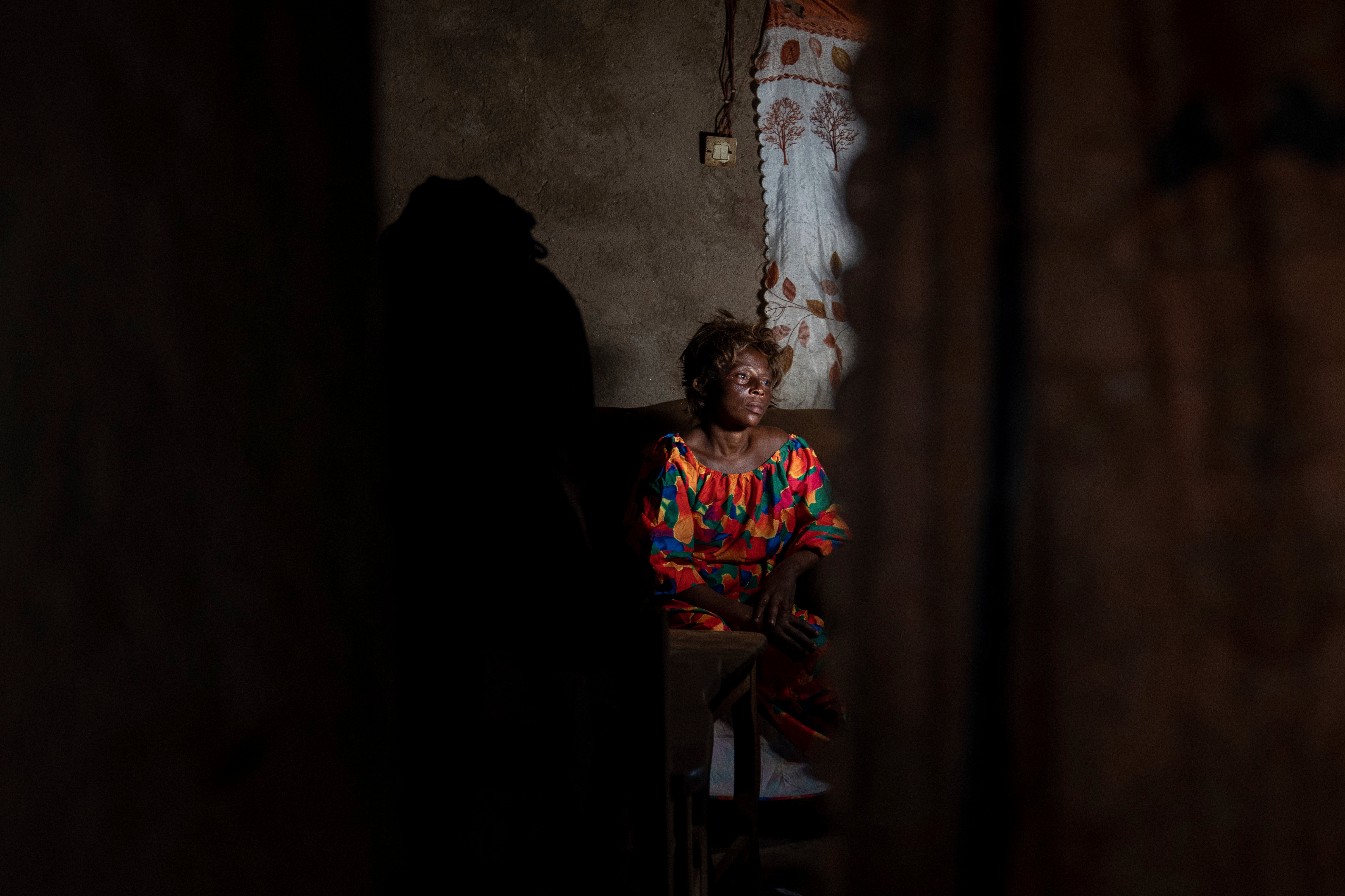 Sifa Kunguja, a 40-year-old sex worker, sits home after recovering from mpox Wednesday, September 4, 2024 in Kamituga