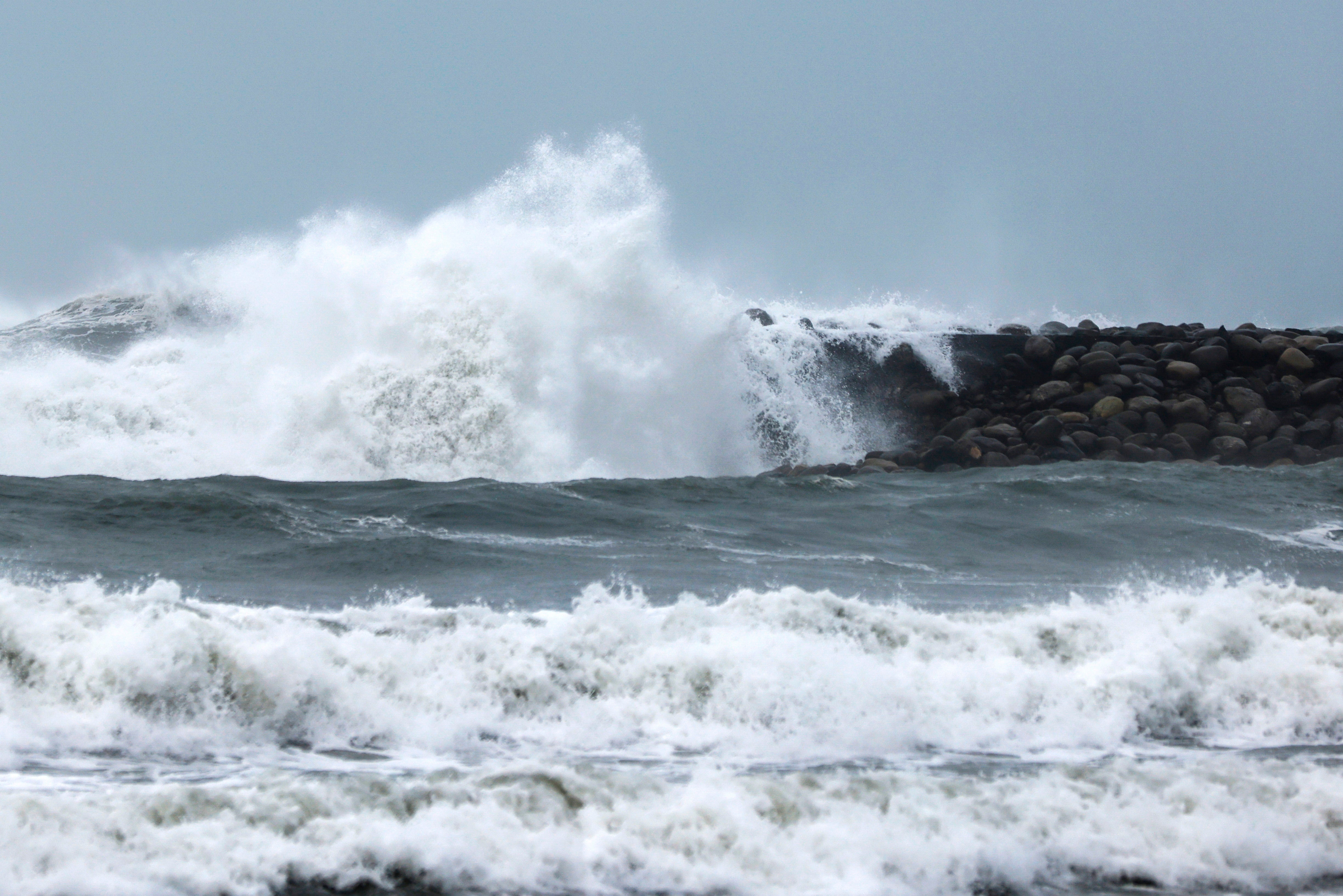 Sea waves brought by Typhoon Krathon fall on a breakwater in a coastal area in Kaohsiung city, Taiwan