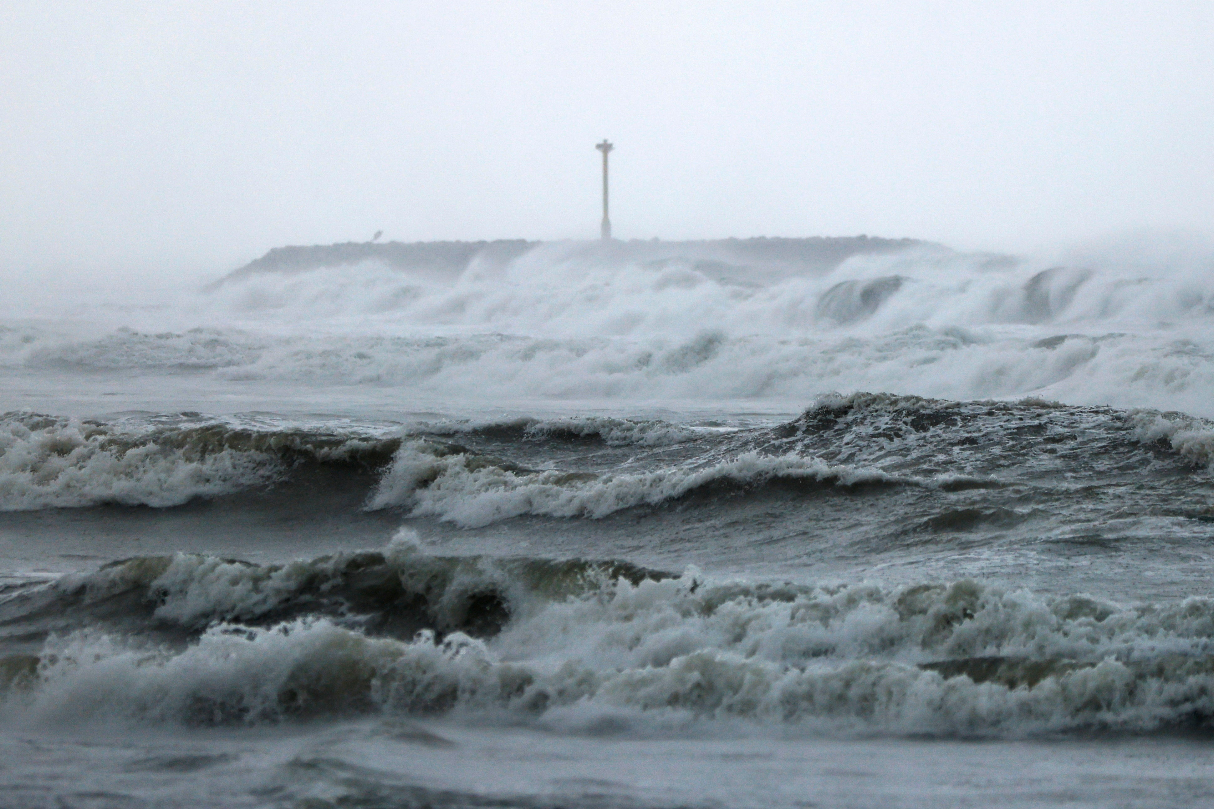 Sea waves brought by Typhoon Krathon fall on a coastal area in Kaohsiung city, Taiwan