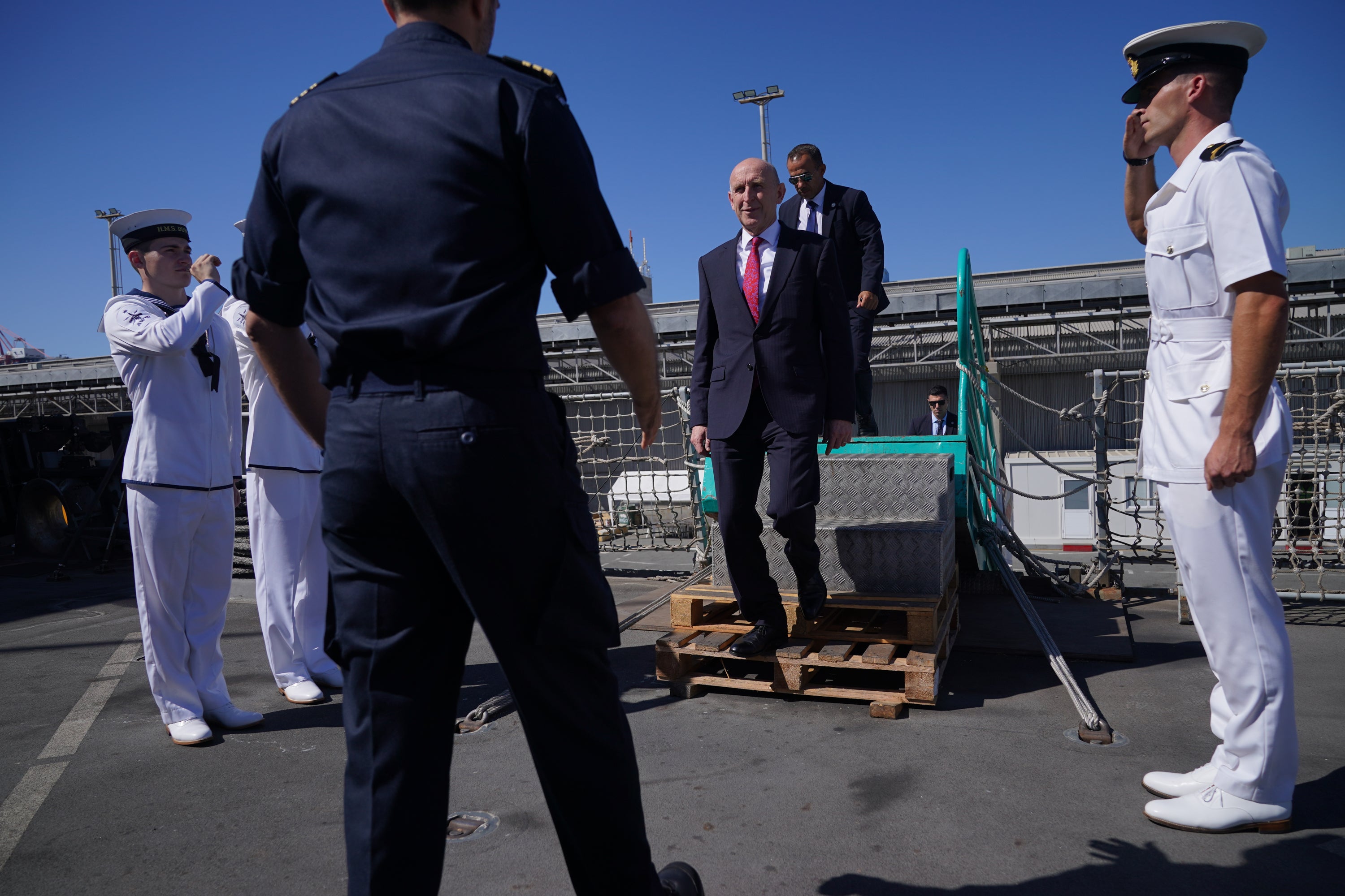 Defence Secretary John Healey is piped aboard HMS Duncan, in the eastern Mediterranean