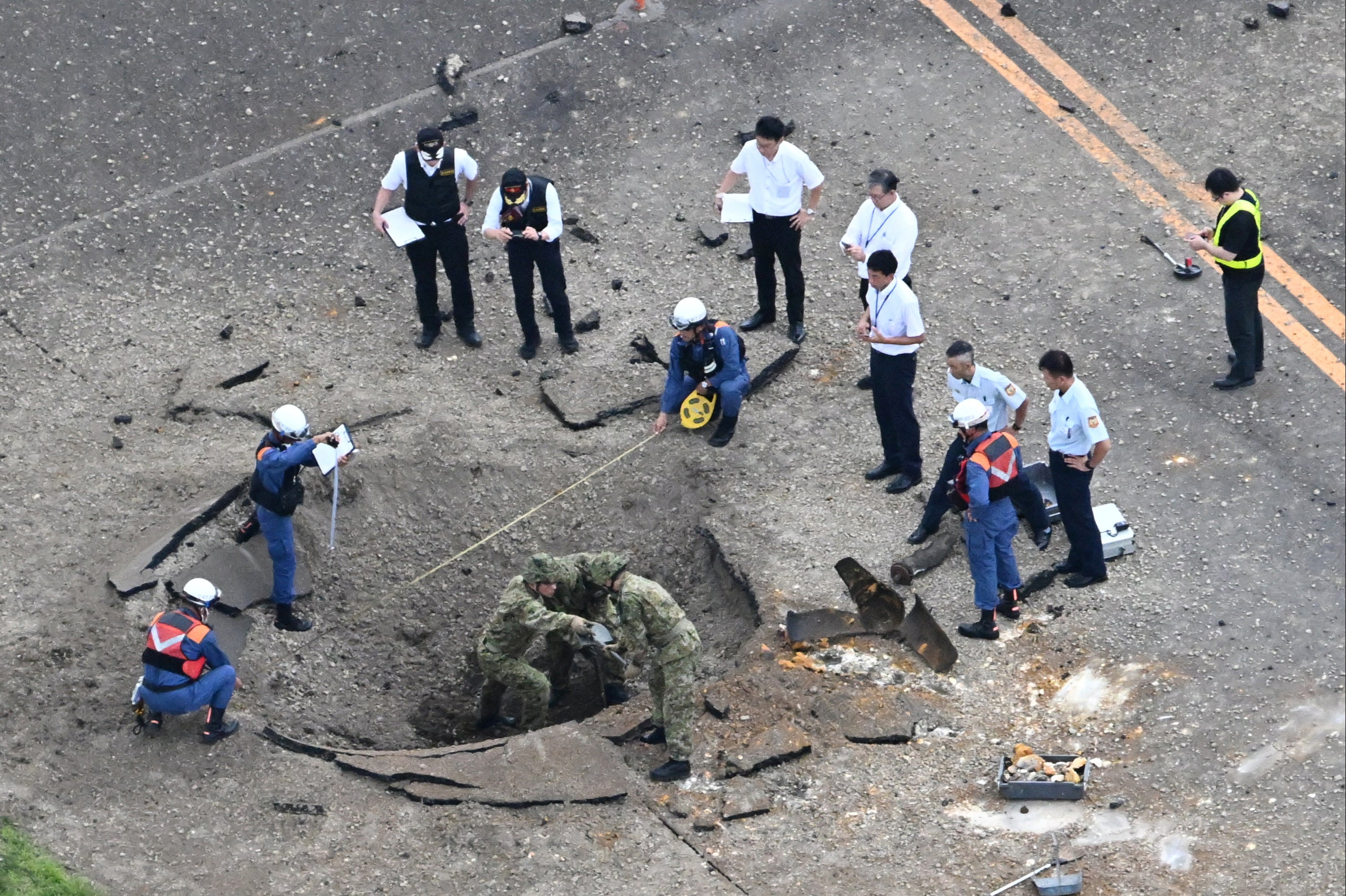 Miyazaki Airport wreckage that appears to be debris from the explosion can be seen on the right side on October 02