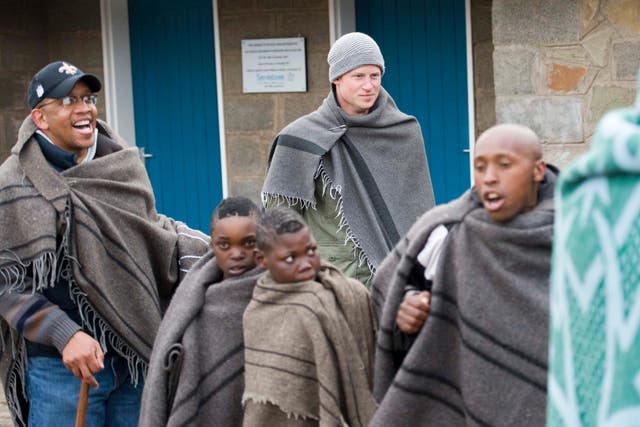 Harry during a visit to a herd boys’ school in Semonkong, Lesotho with Prince Seeiso in 2010 (Arthur Edwards/The Sun/PA)