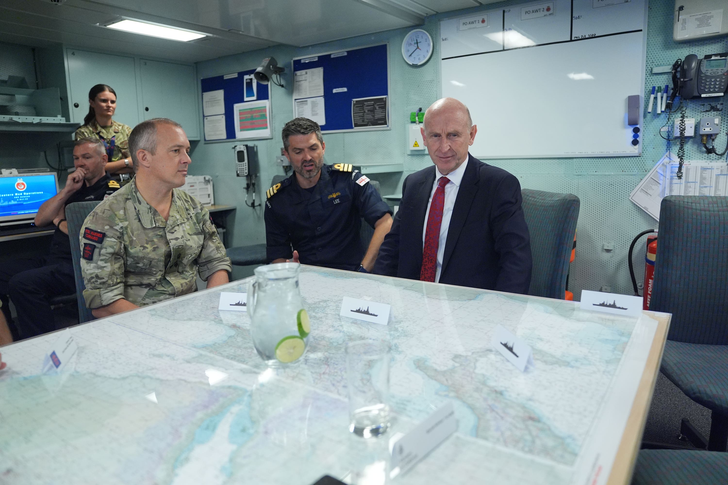 Defence Secretary John Healey in the Joint Planning Room, with Commander Dan Lee (centre), HMS Duncan, and Brigadier Maynard, CJFO (Commander Joint Force Operations) onboard HMS Duncan, in the eastern Mediterranean (Yui Mok/PA)