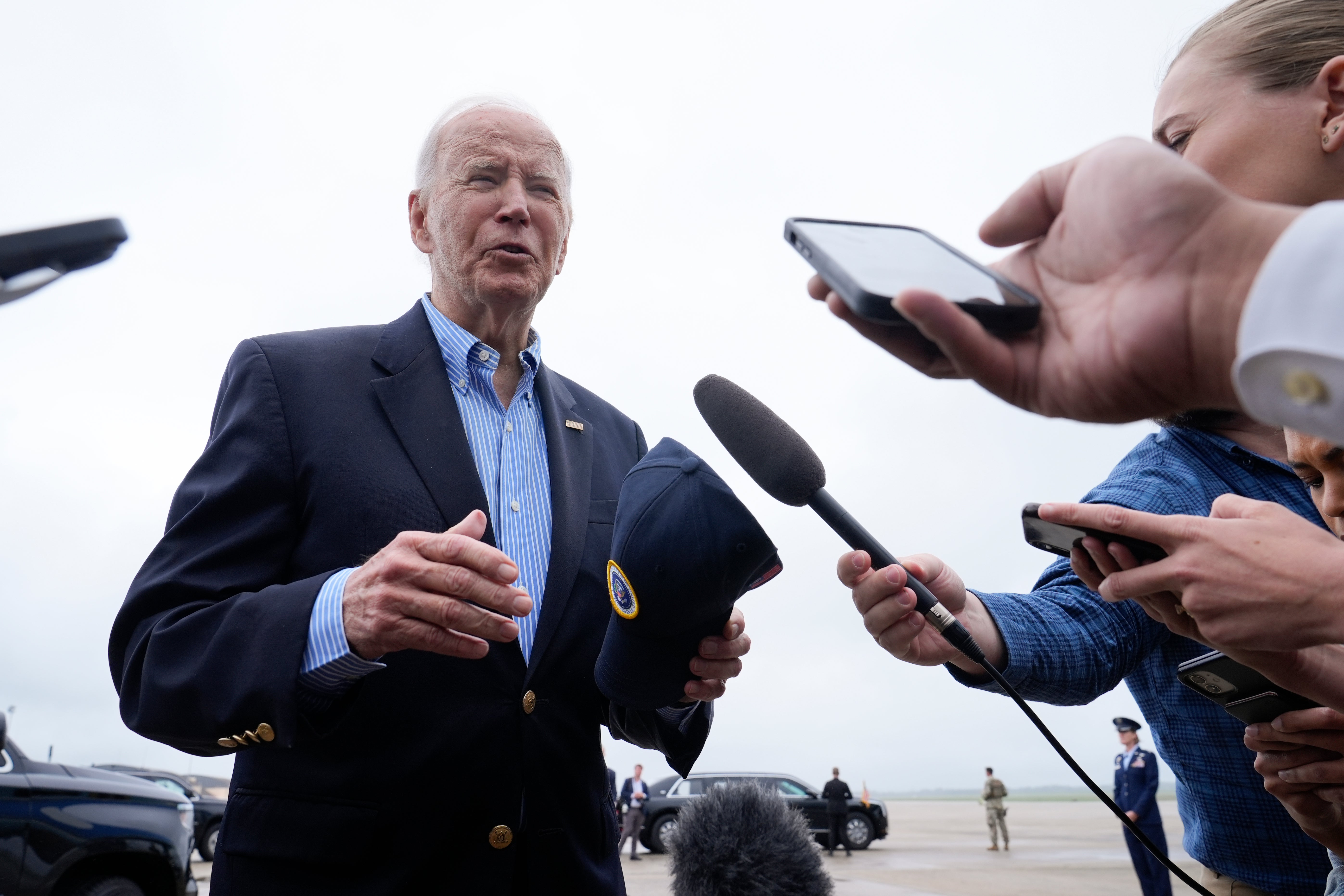 President Joe Biden speaks to the media before boarding Air Force One at Joint Base Andrews, Md., Wednesday, Oct. 2, 2024, as he heads to North and South Carolina to survey damage from Hurricane Helene. (AP Photo/Susan Walsh)