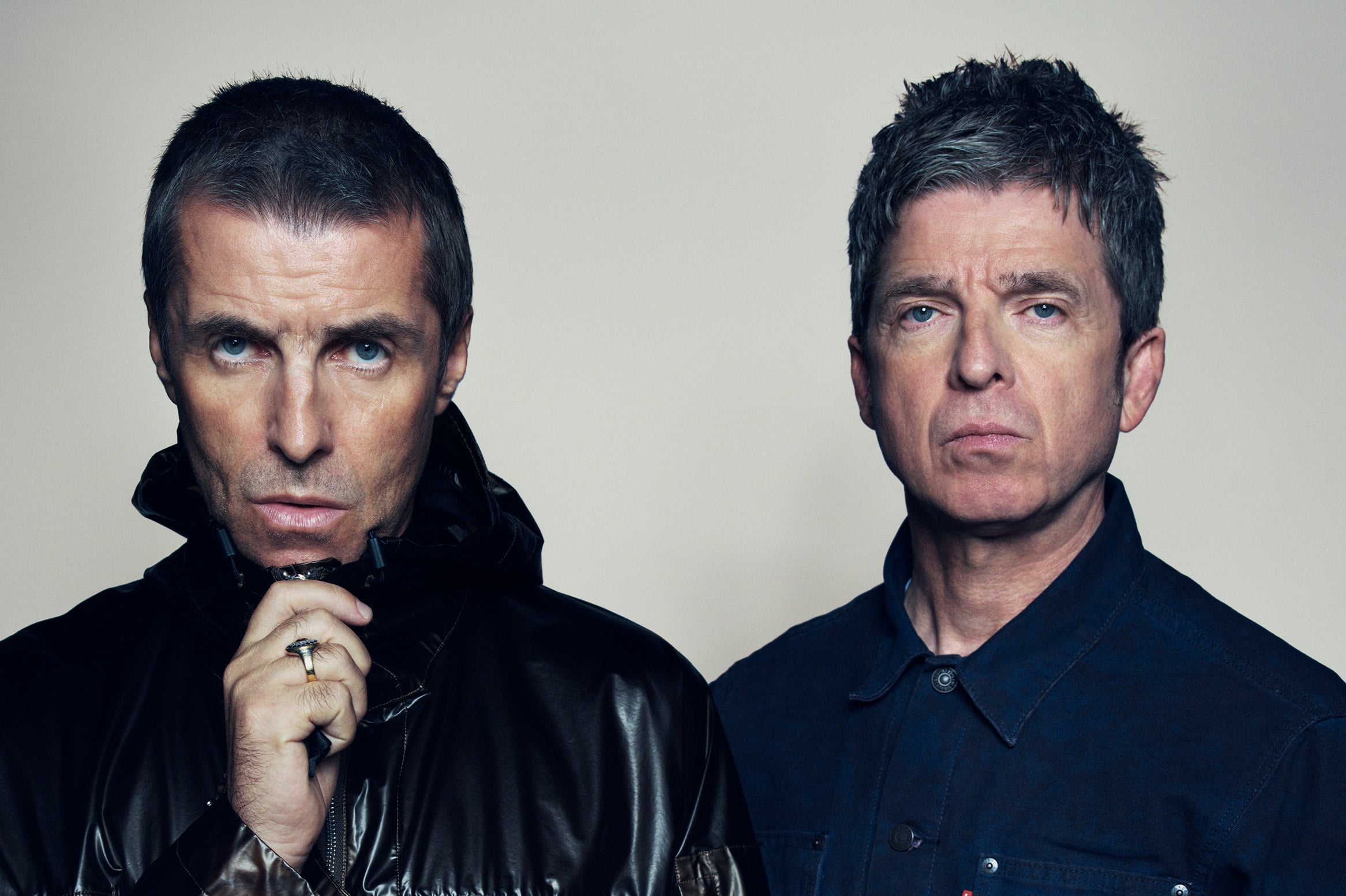 Liam and Noel Gallagher of Oasis will reunite onstage next year