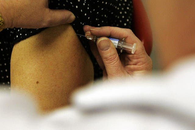 According to the UKHSA there was a drop in people having the flu jab across all eligible groups in England last year (Andrew Milligan/PA)