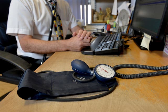 GPs should consider wearing name tags stating their pronouns to support children questioning their gender, it has been suggested (Anthony Devlin/PA)