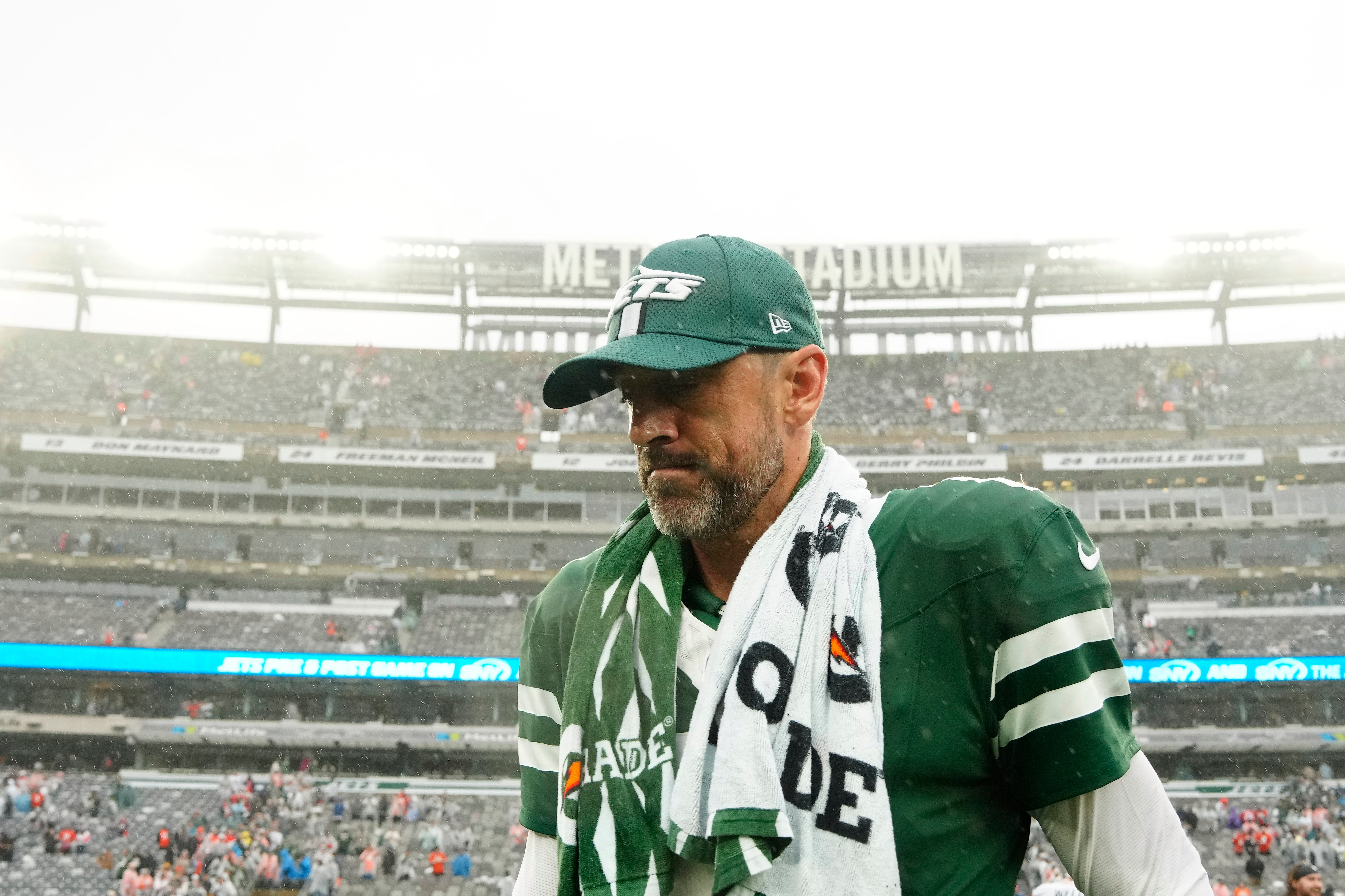 Aaron Rodgers (8) of the New York Jets reacts after a loss against the Denver Broncos