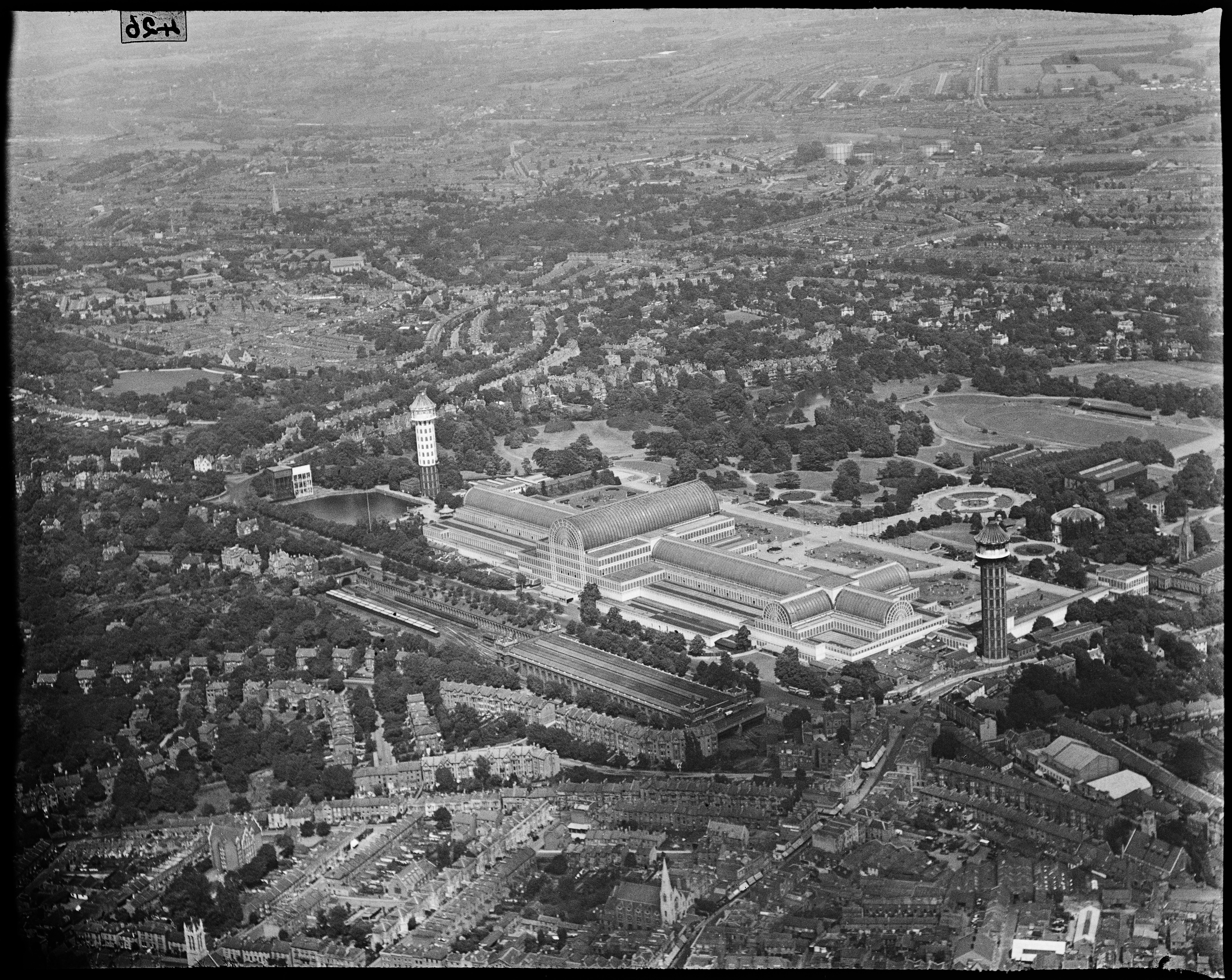 Crystal Palace, Bromley, Greater London, circa 1930s. Originally built to House the Great Exhibition of 1851, the Crystal Palace was moved from Hyde Park to Sydenham Hill. The enlarged structure stood there between 1854 until it was destroyed by fire in 1936