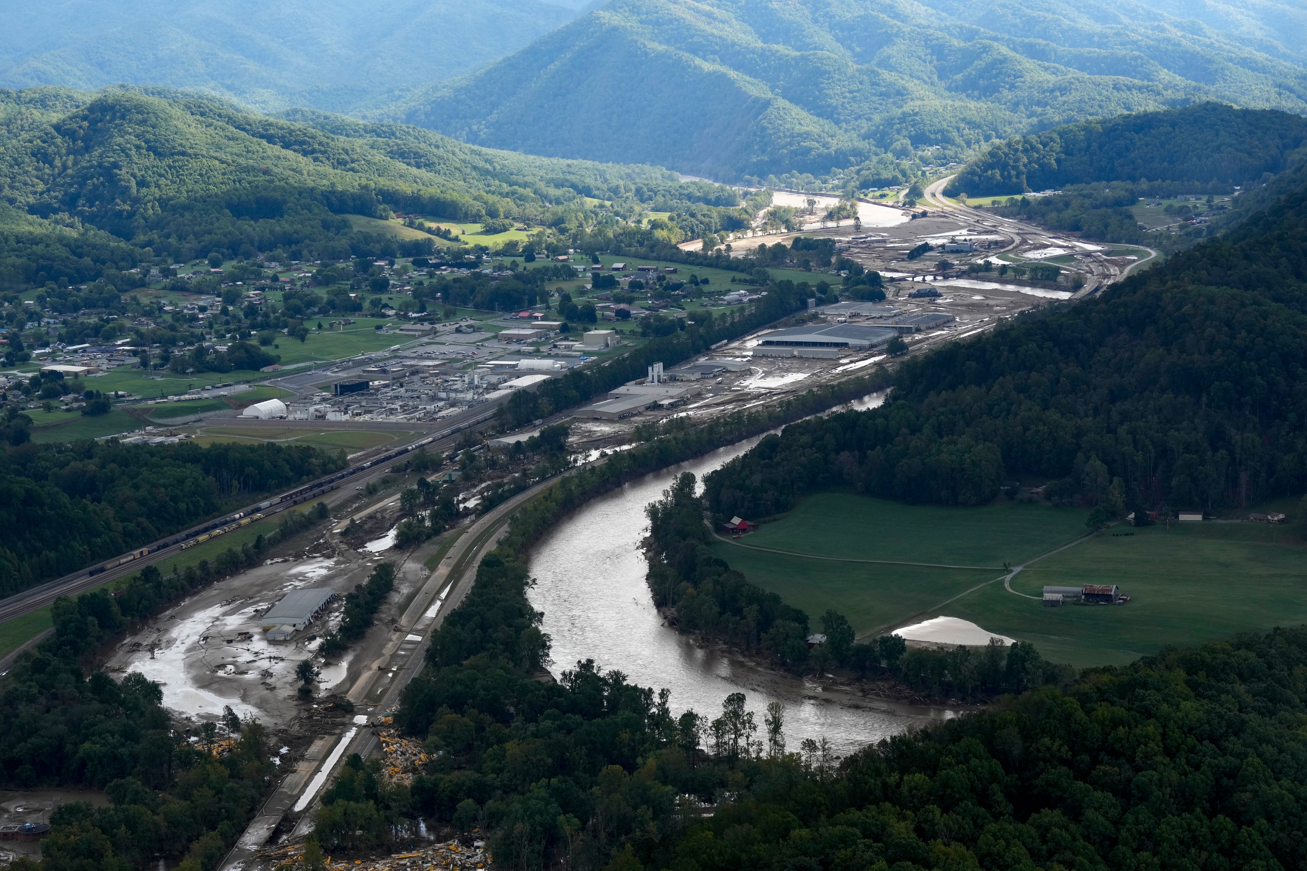 An aerial view shows flood damage in Erwin, Tennessee, in the aftermath of Hurricane Helene on Saturday. Fast, muddy waters swept across the area, forcing some to race to higher ground.