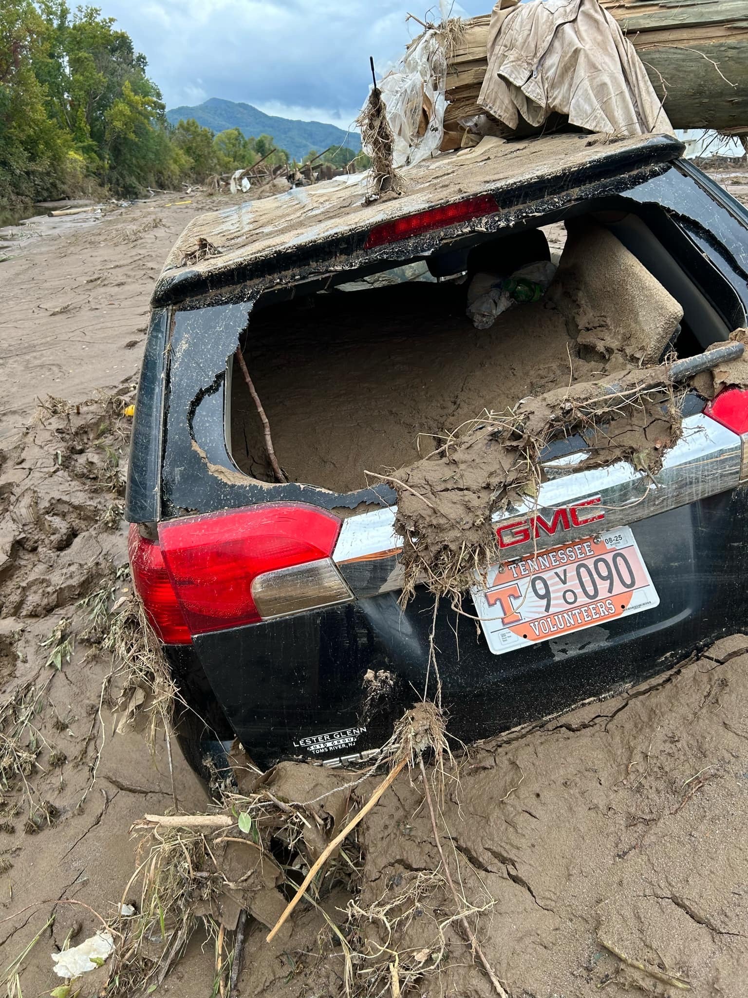 Robert Jarvis’ truck filled with mud following flooding in Erwin, Tennessee, last Friday.