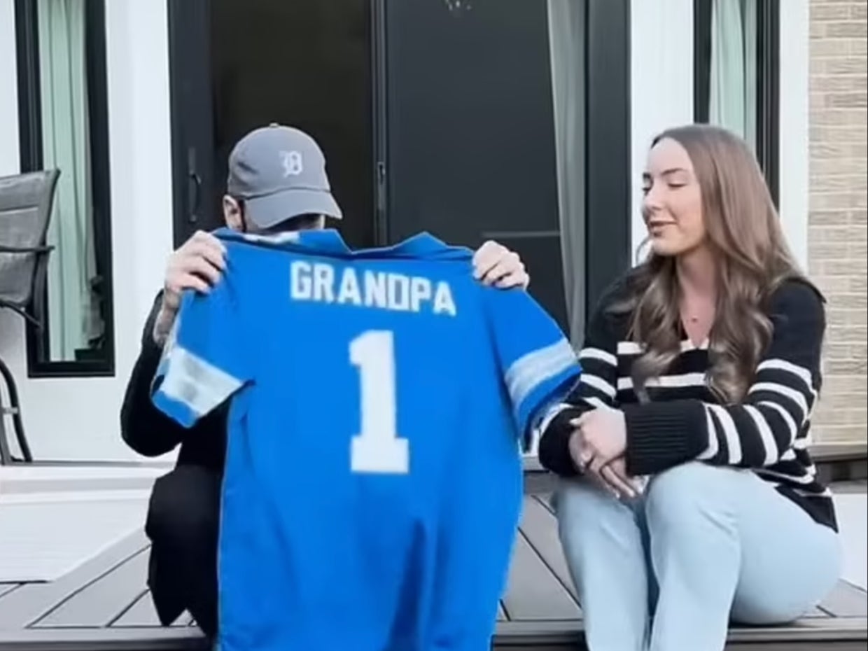 Eminem’s daughter surprised him with the news that she’s expecting her first child by gifting him a Detroit Lions jersey saying ‘Grandpa’ on the back