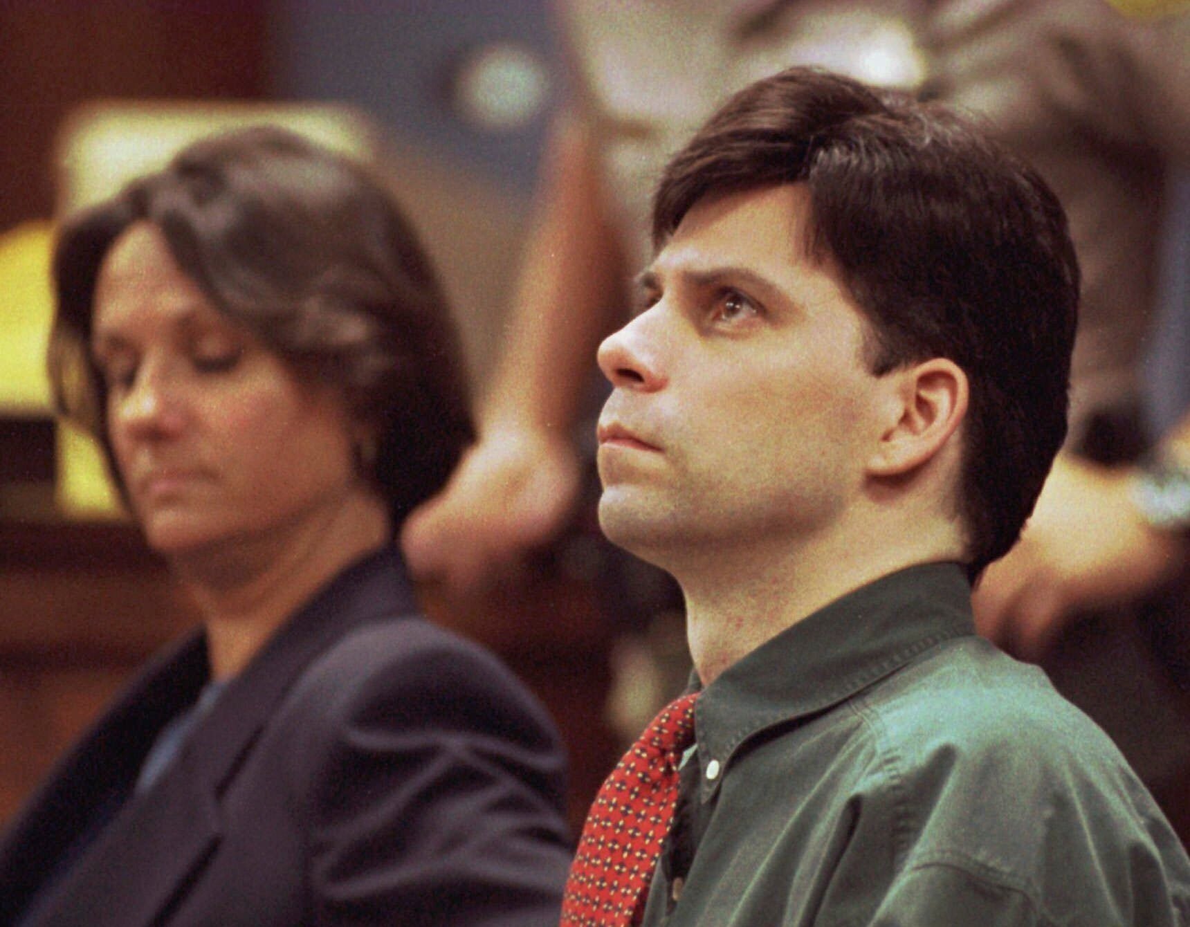 Lyle Menendez looks up during testimony in his and brother Erik's retrial for the shotgun slayings of their parents, Oct. 20, 1995 in Los Angeles. LA District Attorney George Gascon said his office is considering a resentencing and possible release pending a review of their case