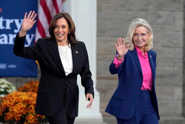 <p>Kamala Harris walks with  Liz Cheney at a campaign rally at Ripon College, Wisconsin </p>