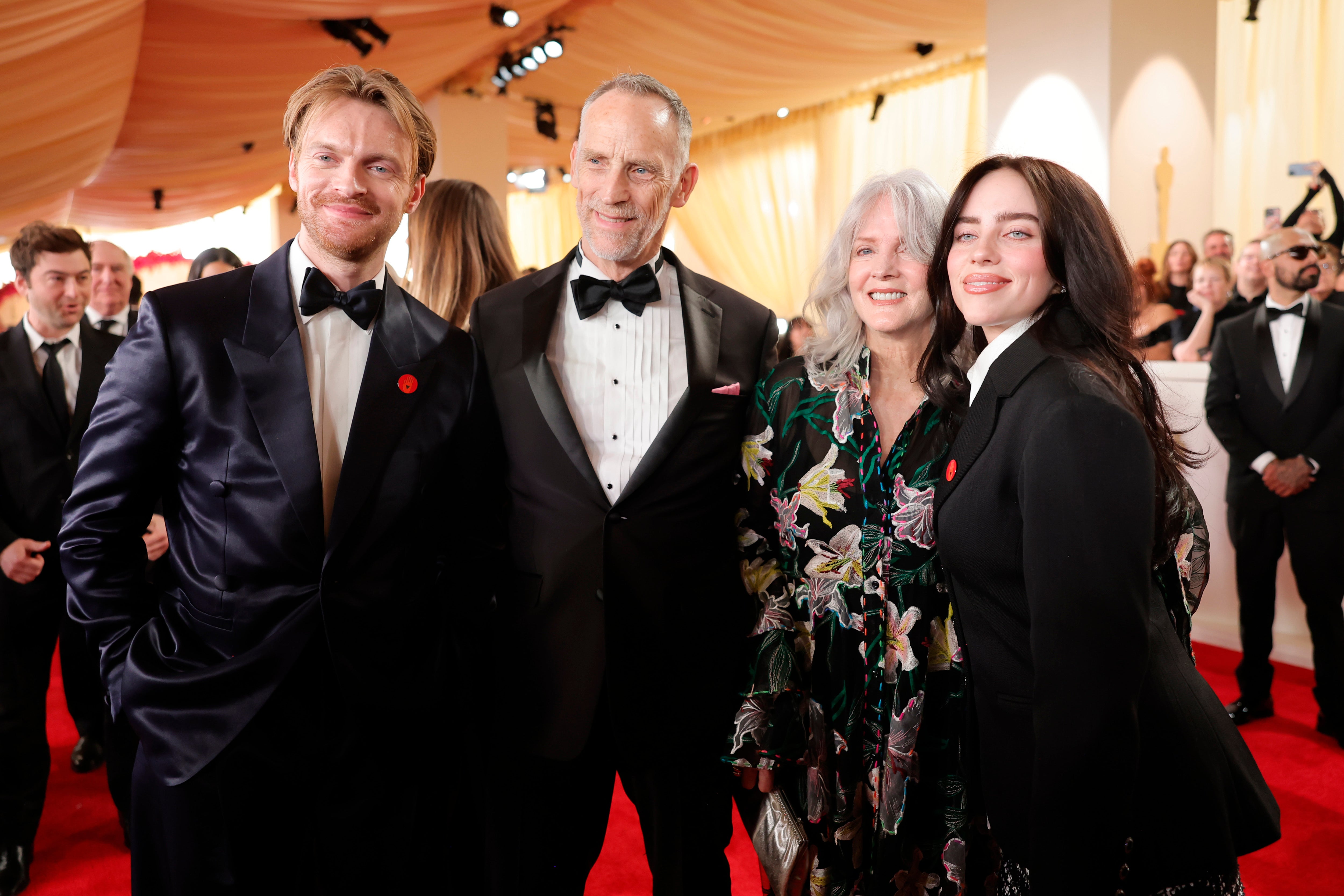 Finneas O’Connell, Patrick O’Connell, Maggie Baird, and Billie Eilish attend the 96th Annual Academy Awards