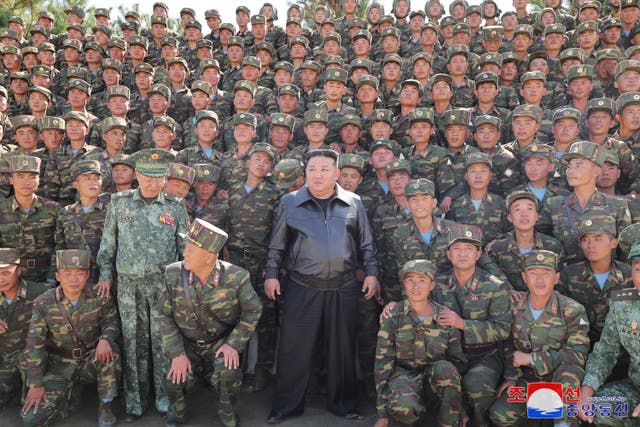 <p>North Korea’s leader Kim Jong Un poses with troops during an inspection at a training base earlier this month </p>