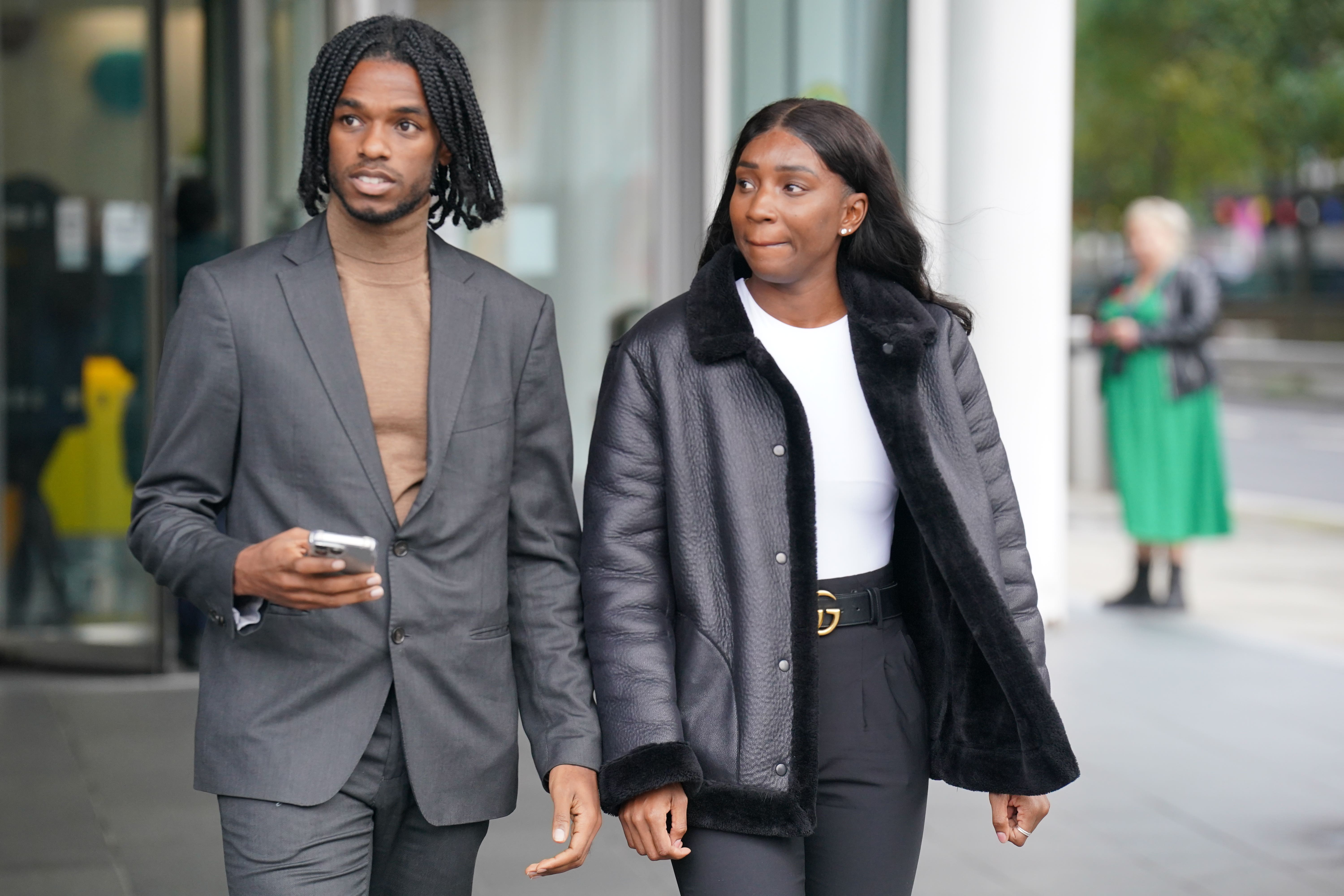 Athletes Bianca Williams and Ricardo Dos Santos walking to speak to the media outside Palestra House, central London, in 2023 (Jonathan Brady/PA)