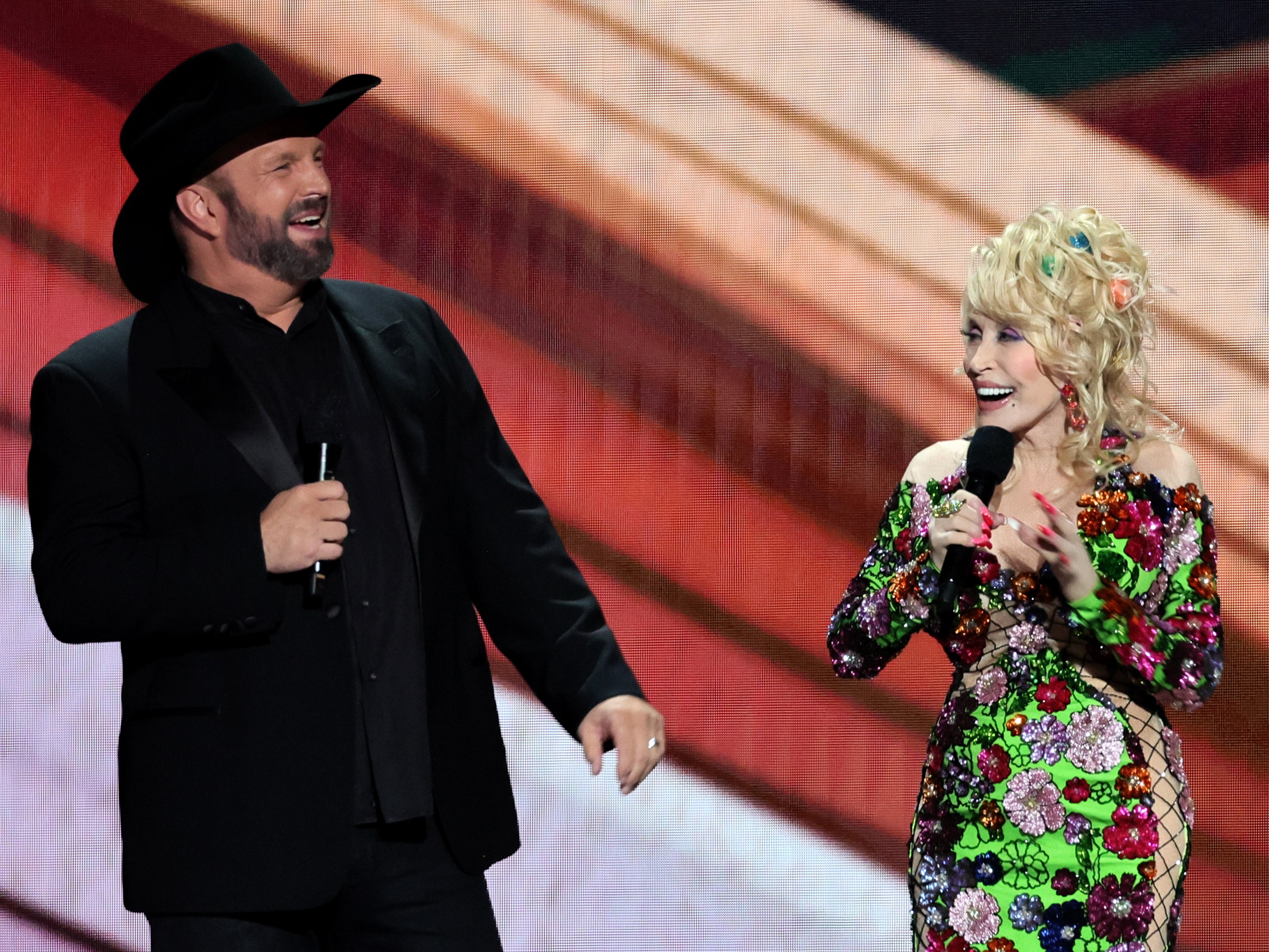 Garth Brooks with co-host Dolly Parton at the 2023 Country Music Awards