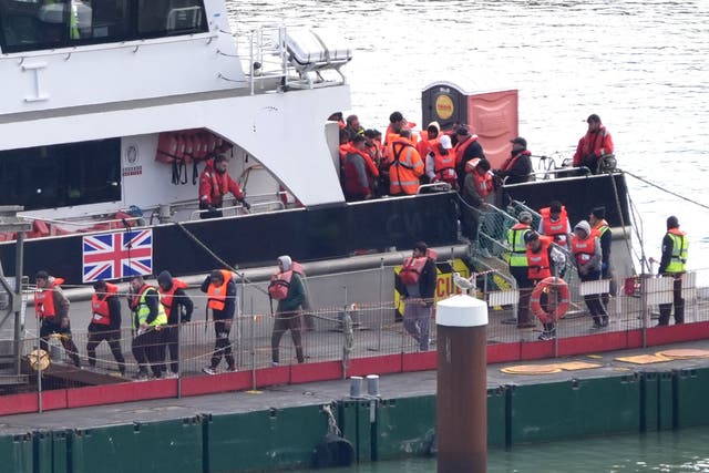 A group of people thought to be migrants are brought in to Dover, Kent, from a Border Force vessel (Gareth Fuller/PA)