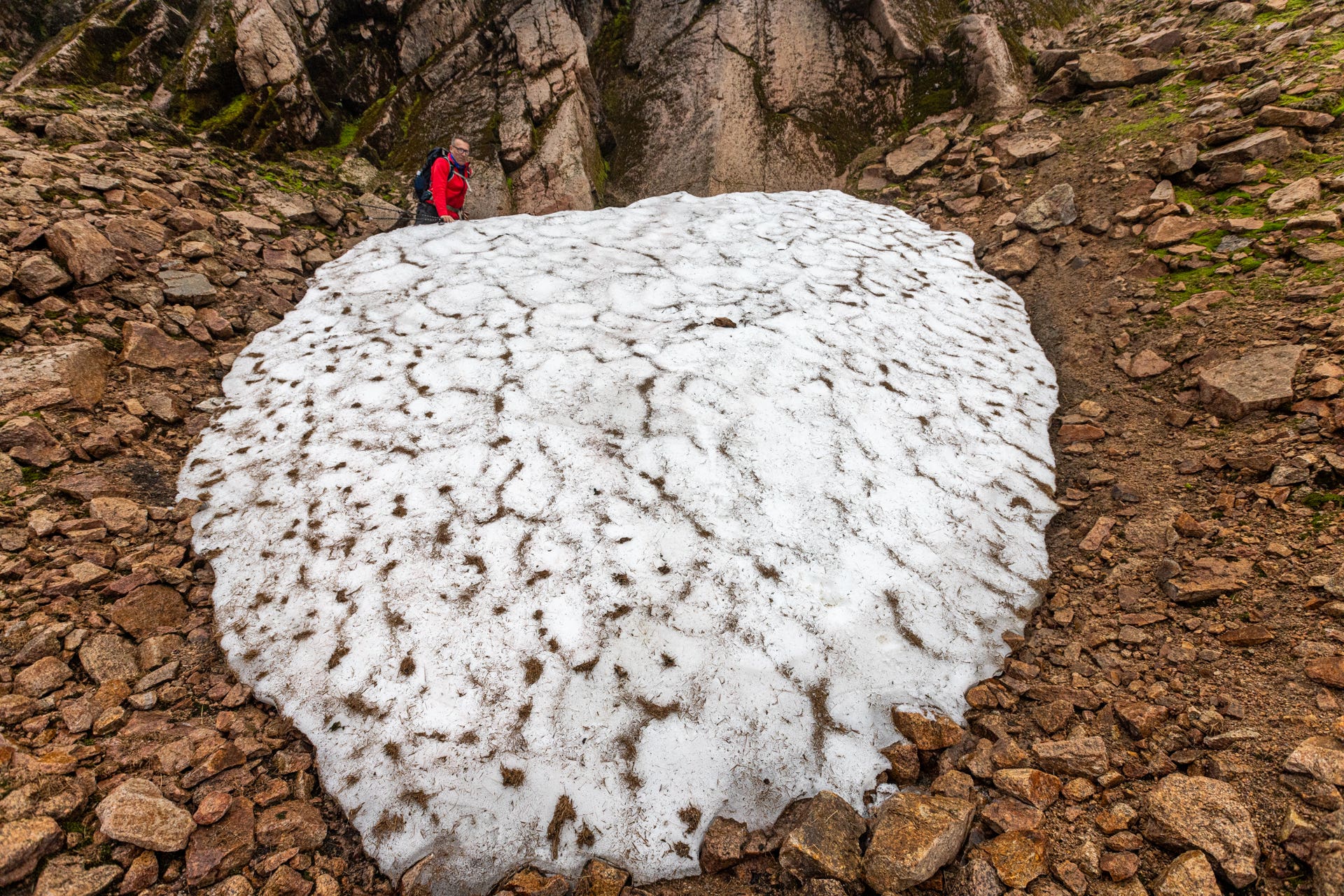 Iain Cameron standing above the Sphinx snow patch (Climate Centre/PA)