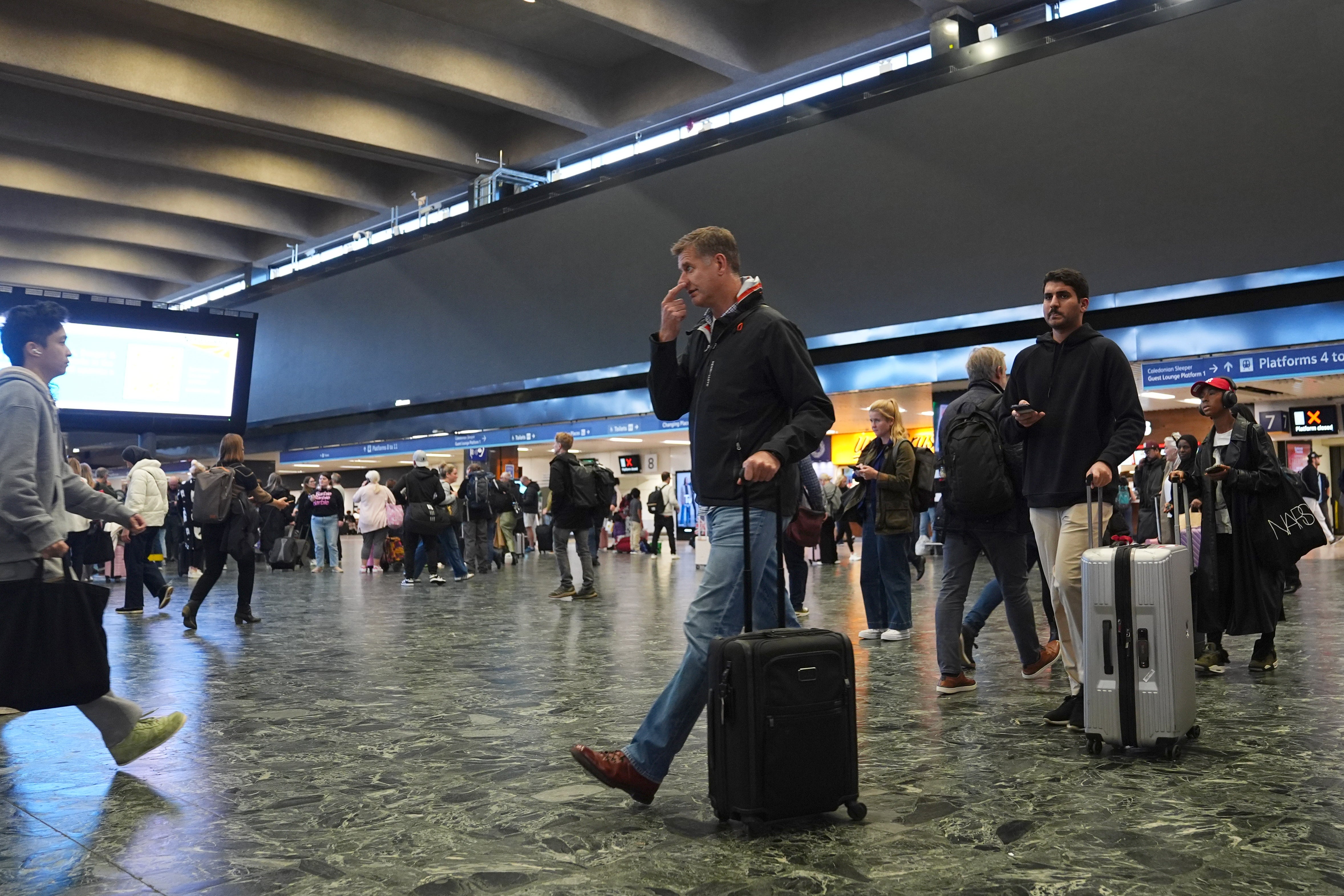 The large advertising board at Euston station has been switched off (James Manning/PA)