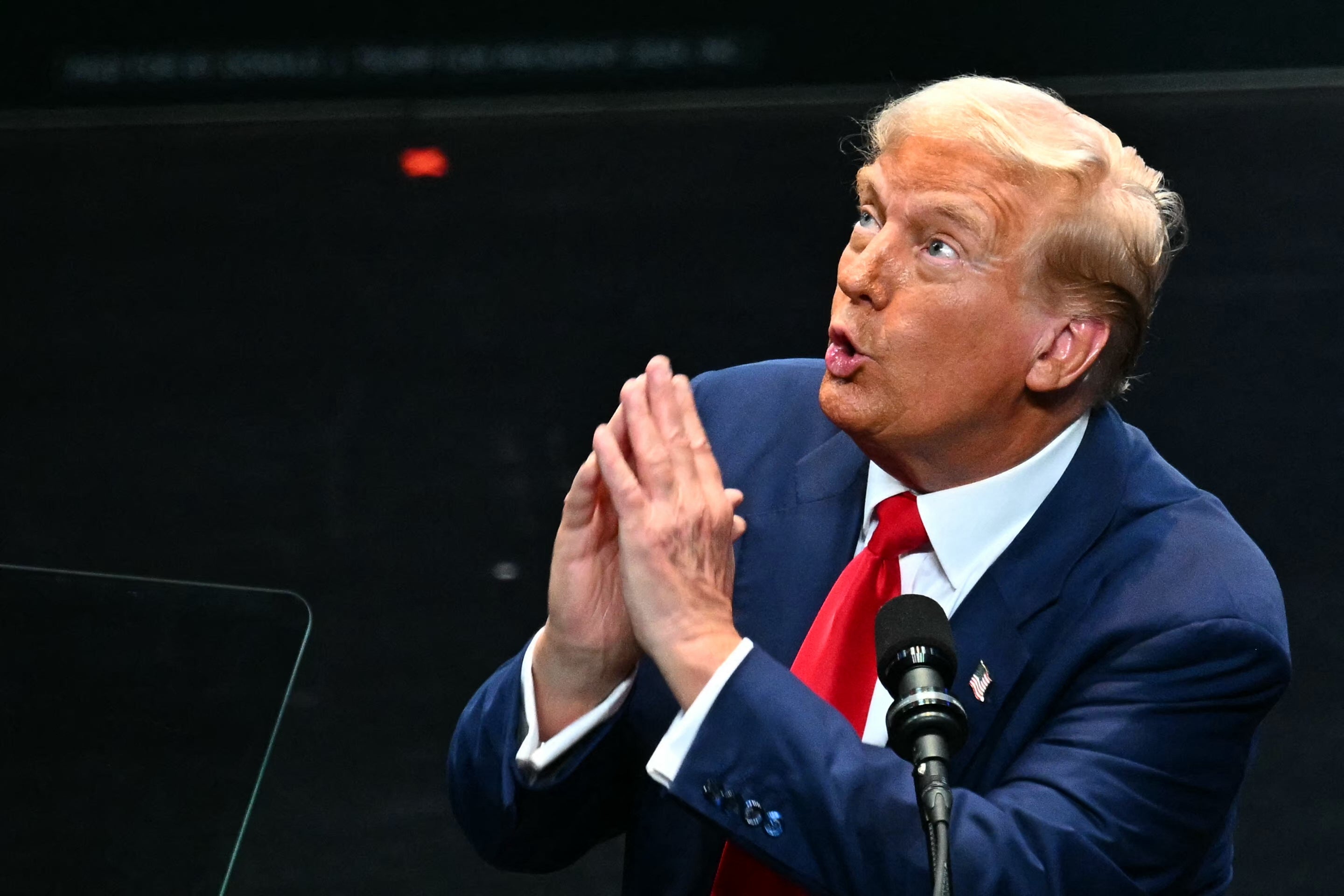 Trump speaks during a campaign rally at Johnny Mercer Theatre Civic Center in Savannah, Georgia, on September 24. He has claimed God spared his life in the two recent assassination attempts