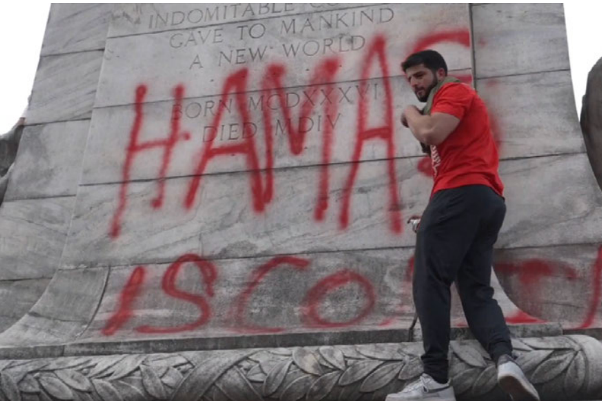 Protester sprayed ‘Hamas is comin’ at a pro-Gaza rally. He was turned in to police by a gym buddy