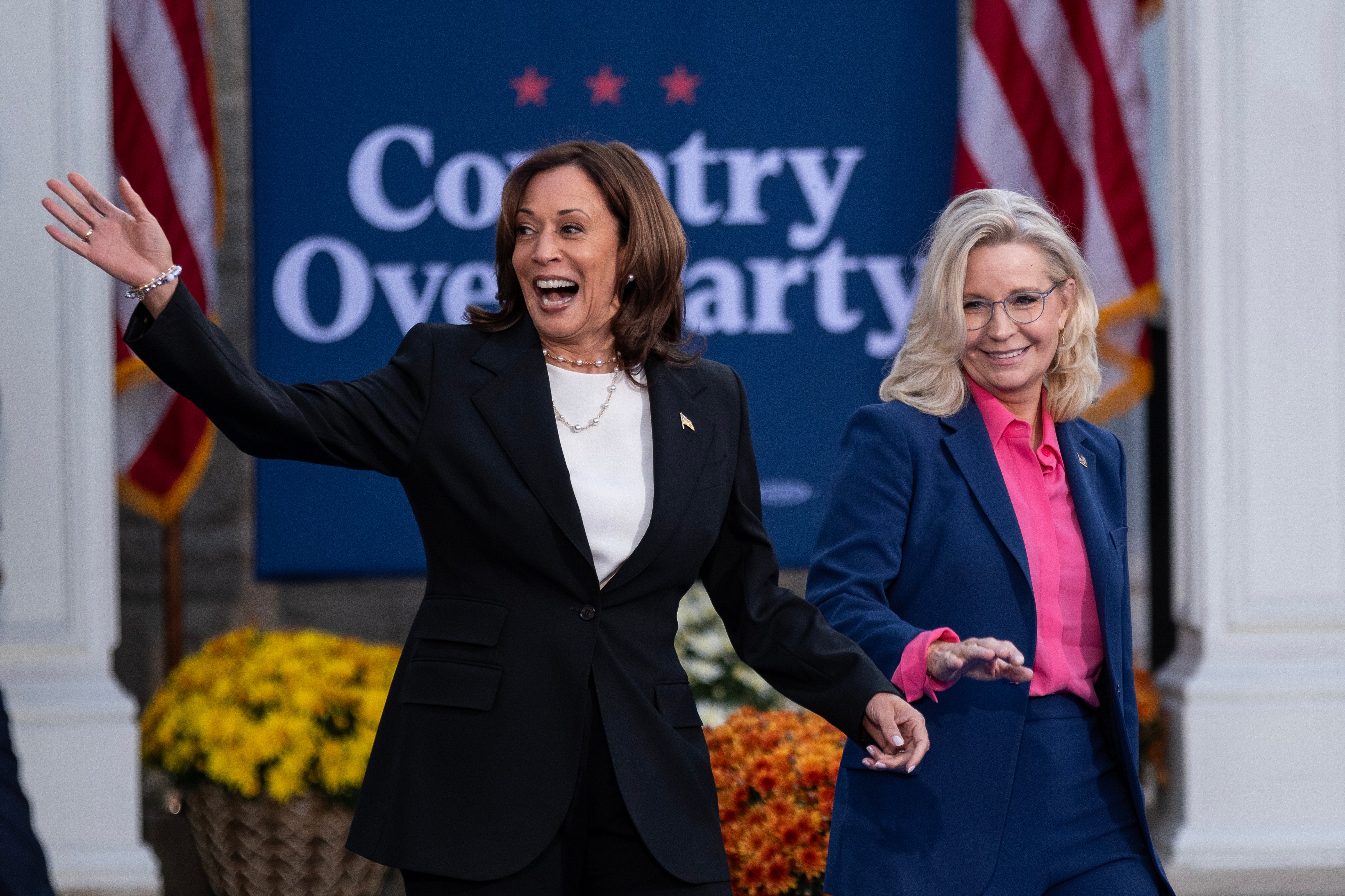 Kamala Harris, left, with Liz Cheney during a rally at Ripon College in Wisconsin