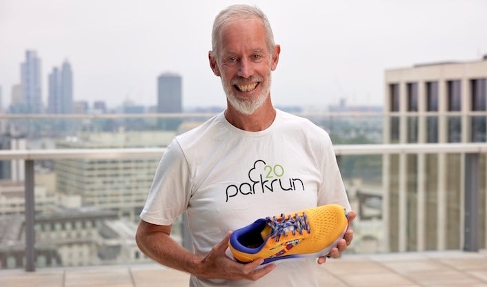 Mr Sinton-Hewitt with the Brooks Ghost 16 parkrun trainers, which were created to commemorate the event’s 20th anniversary