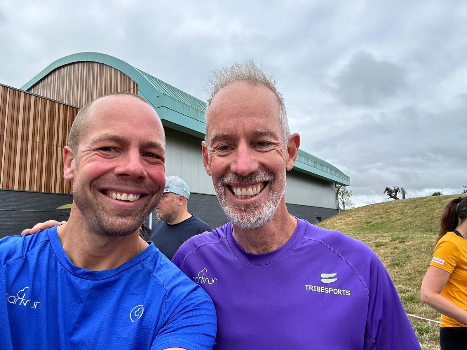 Darren Wood, who has taken part in 913 parkruns, with Mr Sinton-Hewitt