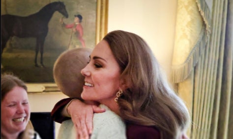 A picture taken of Princess Kate hugging Liz Hatton, 16, went viral last week