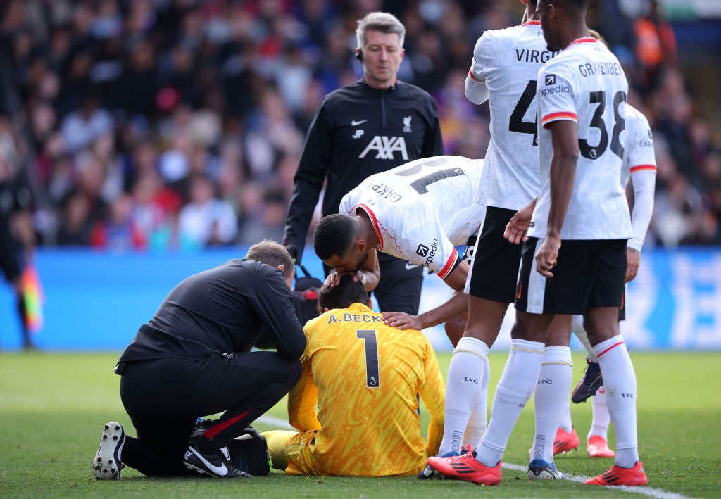 Alisson limped off after a series of saves