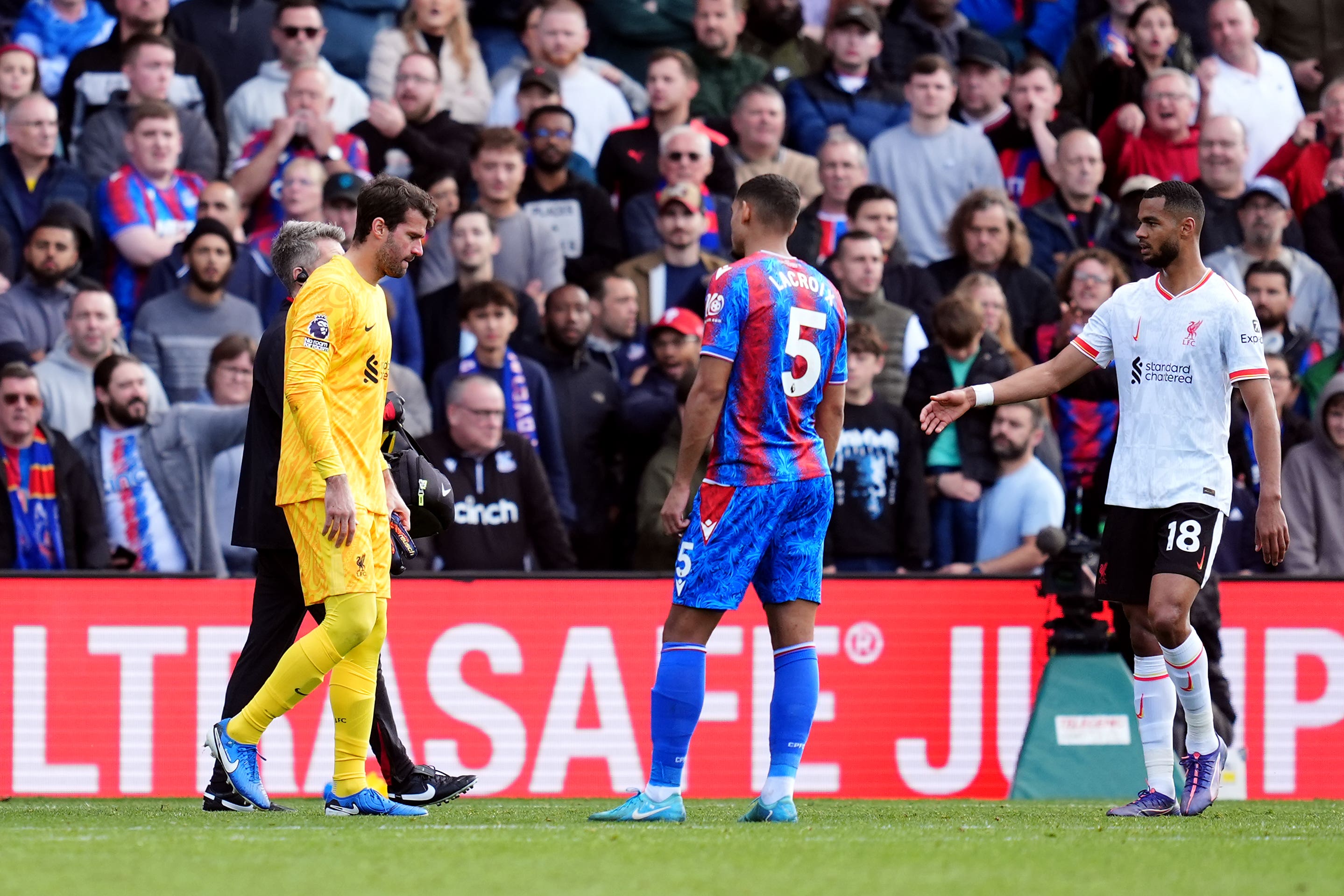 Liverpool goalkeeper Alisson Becker leaves the pitch (Adam Davy/PA)