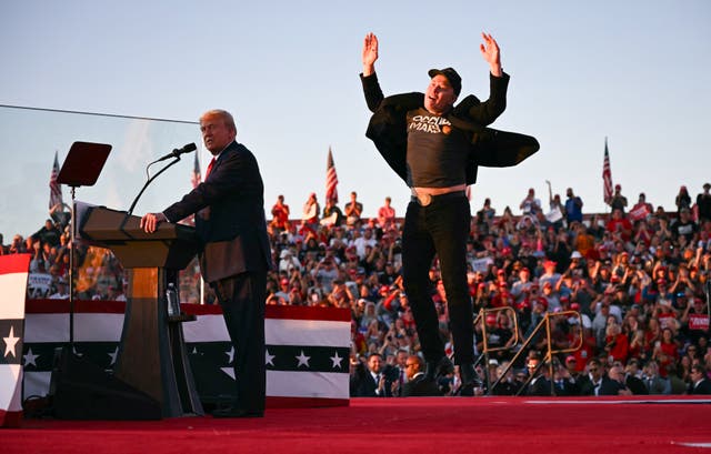 <p>Tesla CEO Elon Musk jumps on stage as he joins Donald Trump during a campaign rally at site of his first assassination attempt in Butler, Pennsylvania on October 5. </p>