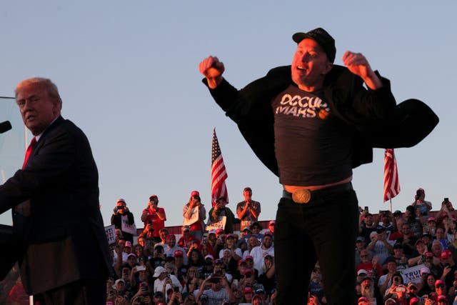 <p>One picture from the event shows Elon Musk in the middle of a jaunty little half-hop while Trump looks on like a disappointed father </p>