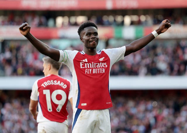 <p> Bukayo Saka celebrates in front of Arsenal’s fans</p>