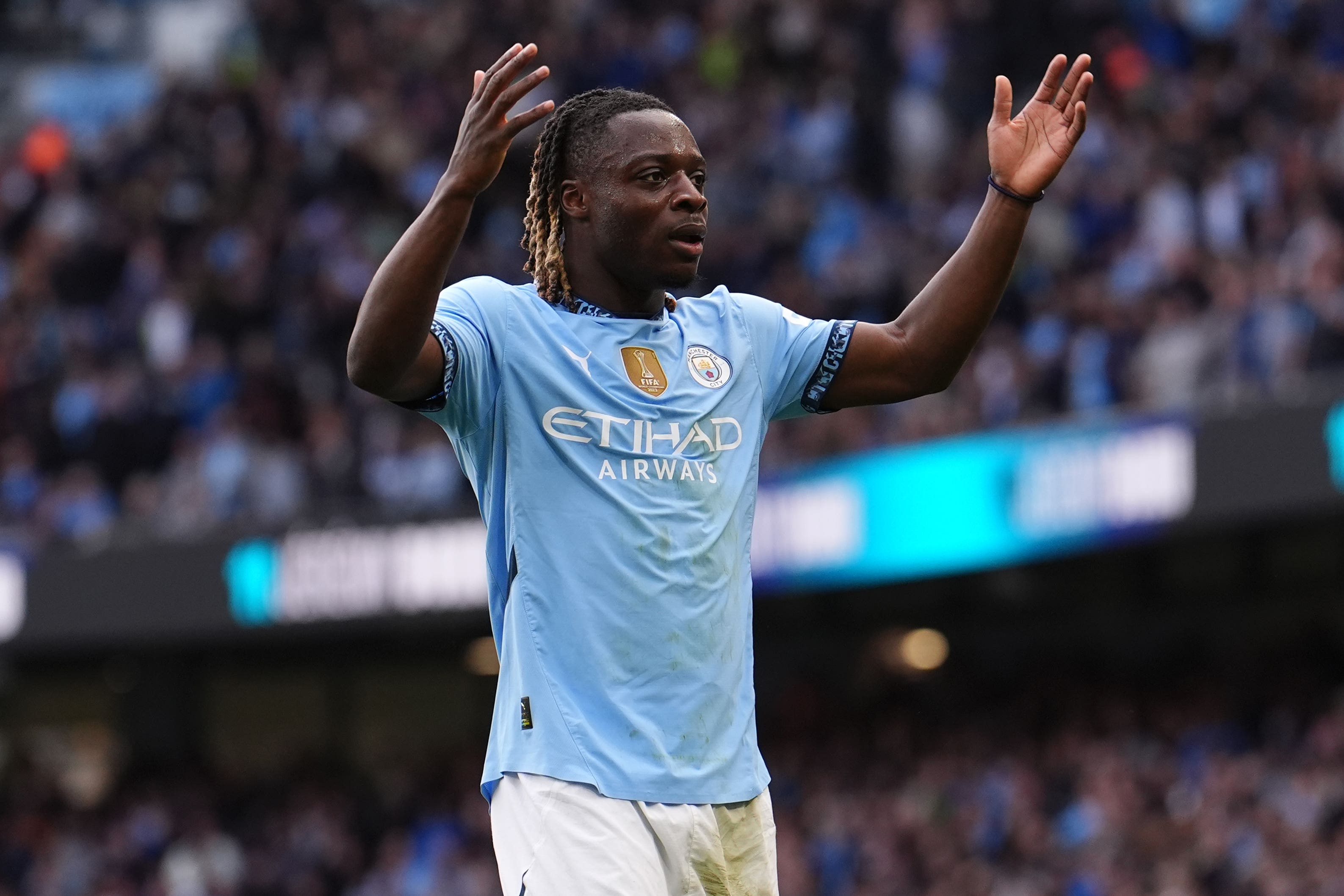 Jeremy Doku was on target as Manchester City claimed a hard-fought win against Fulham (Martin Rickett/PA)