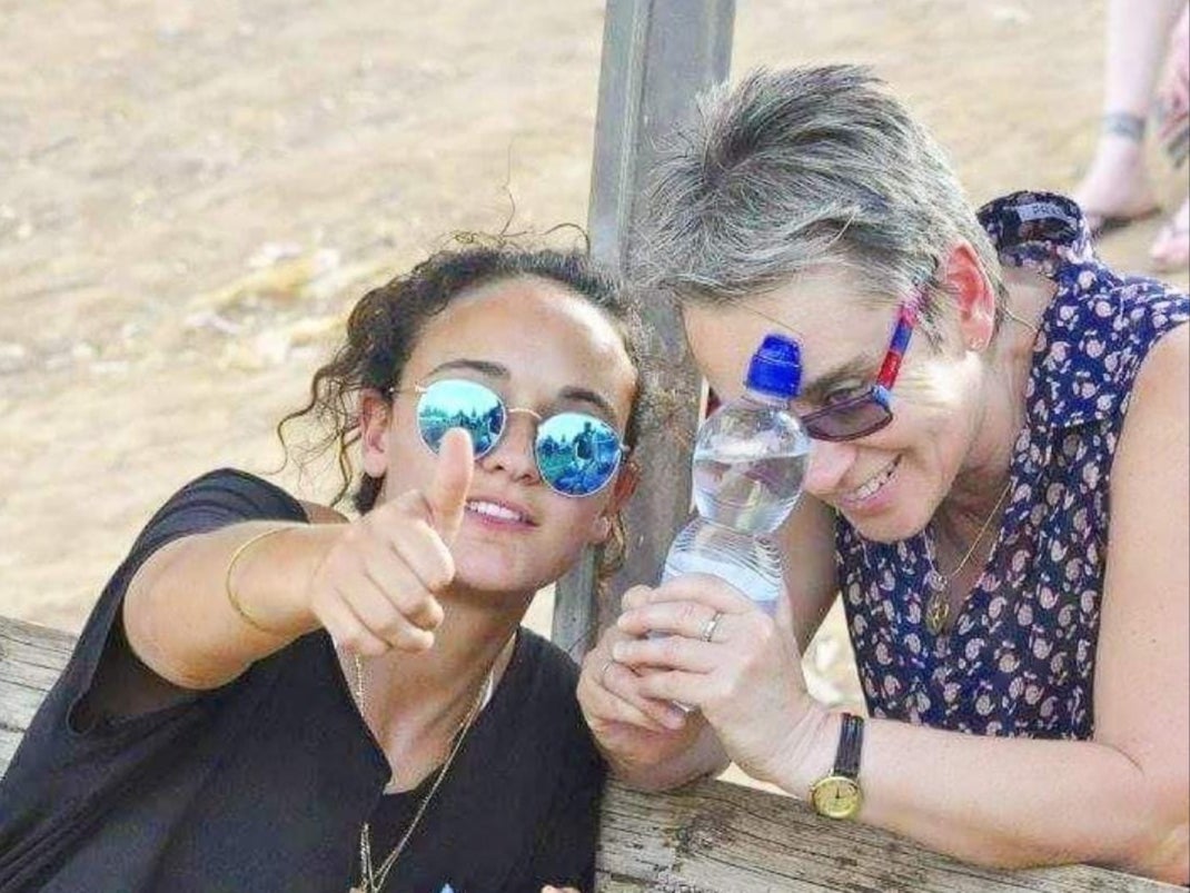 Emily and Mandy Damari are pictured together on a beach