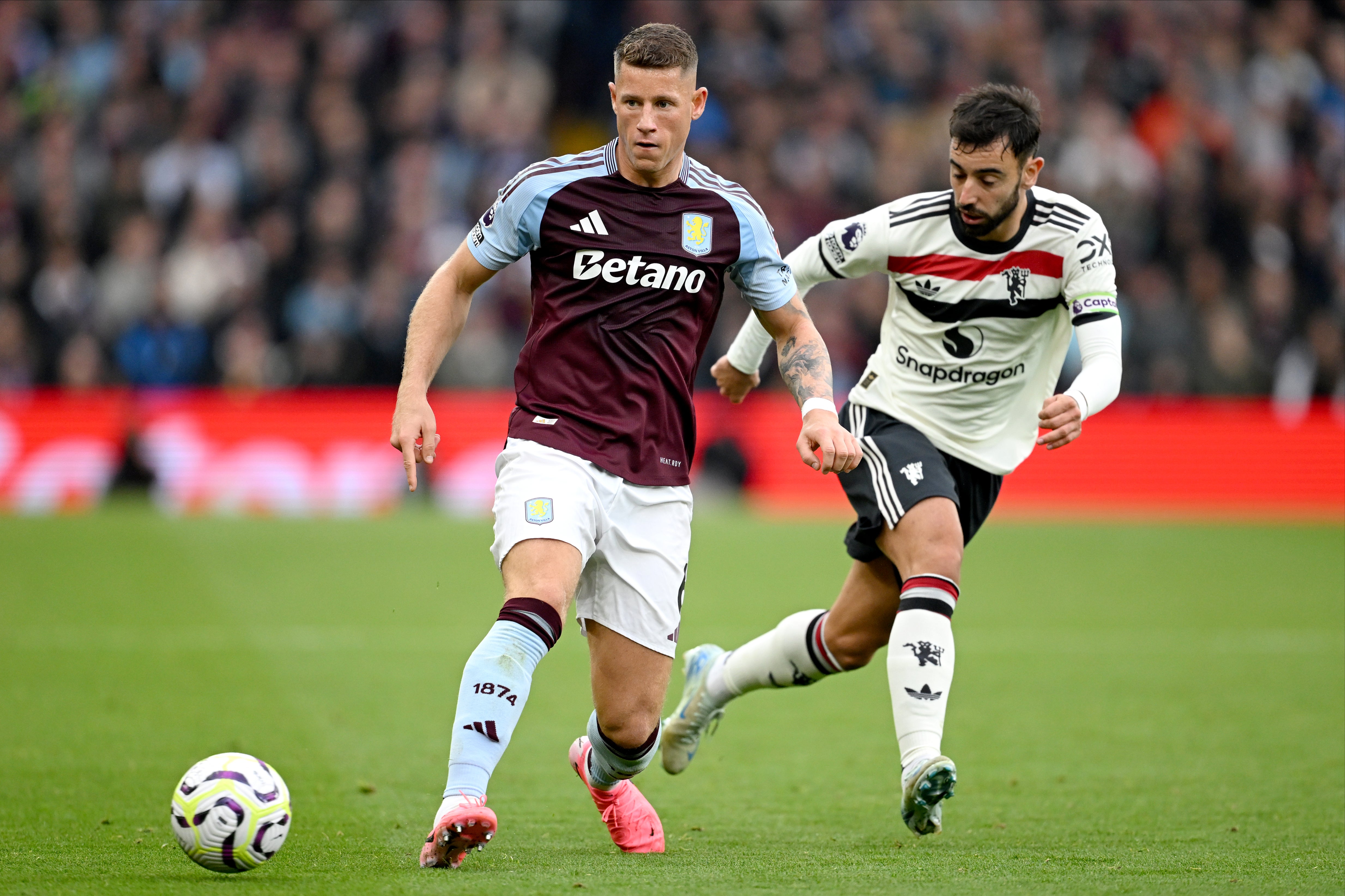 Ross Barkley is watched by Bruno Fernandes