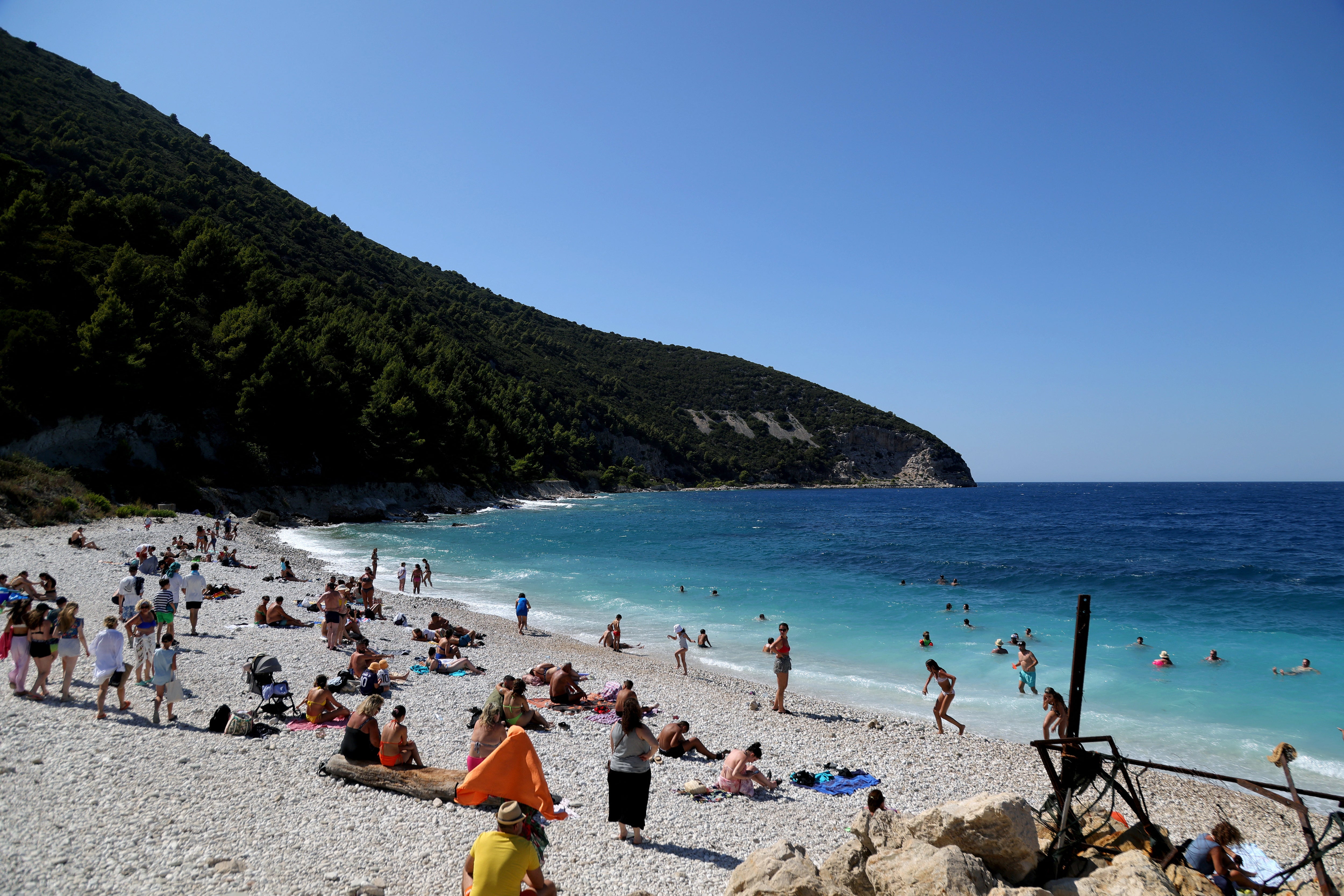 Tourists on the island of Sazan