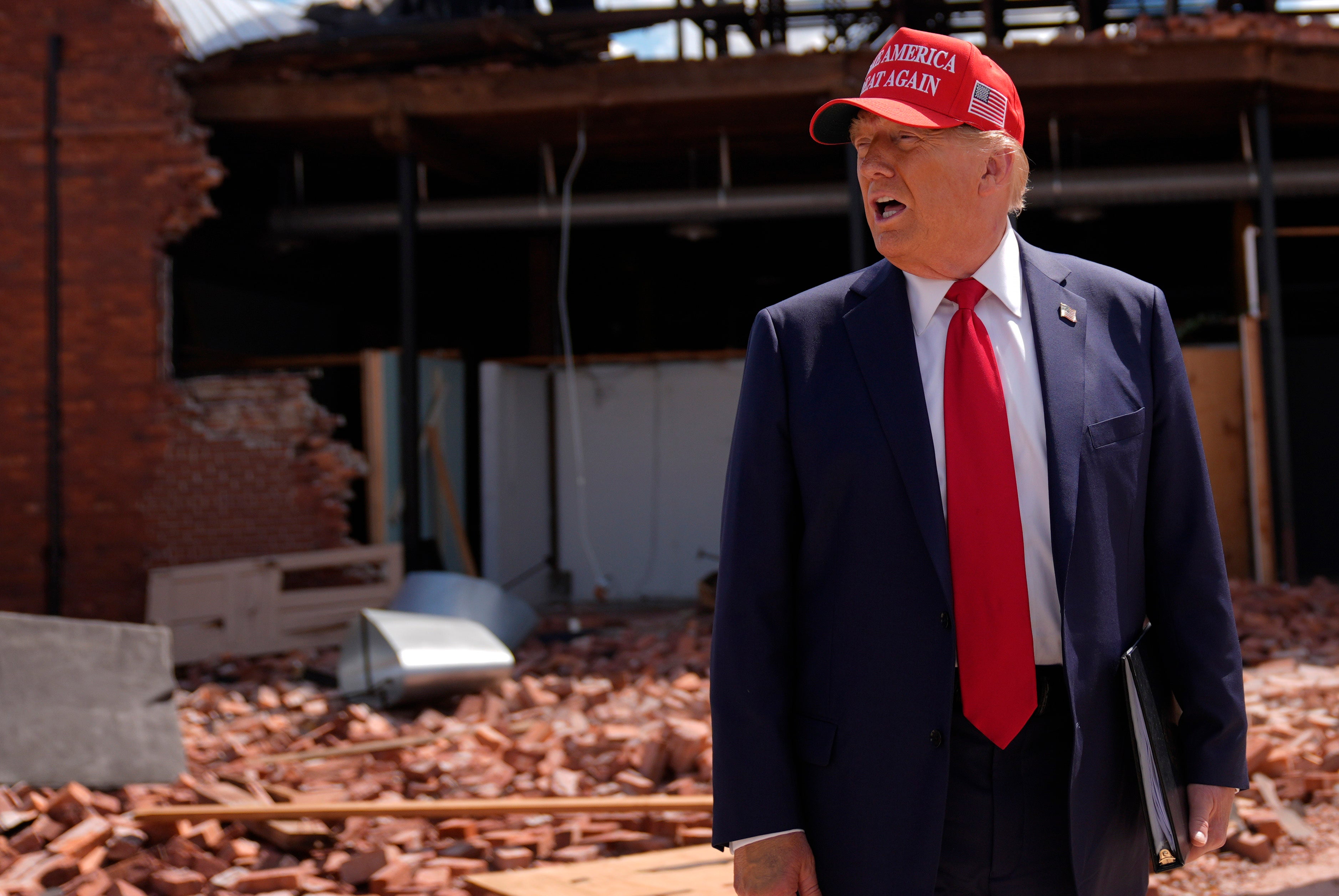 Donald Trump tours downtown Valdosta, Georgia, a town that was impacted by Hurricane Helene, on September 30. The former president and his allies have been spreading false claims about the federal government’s response to the disaster.