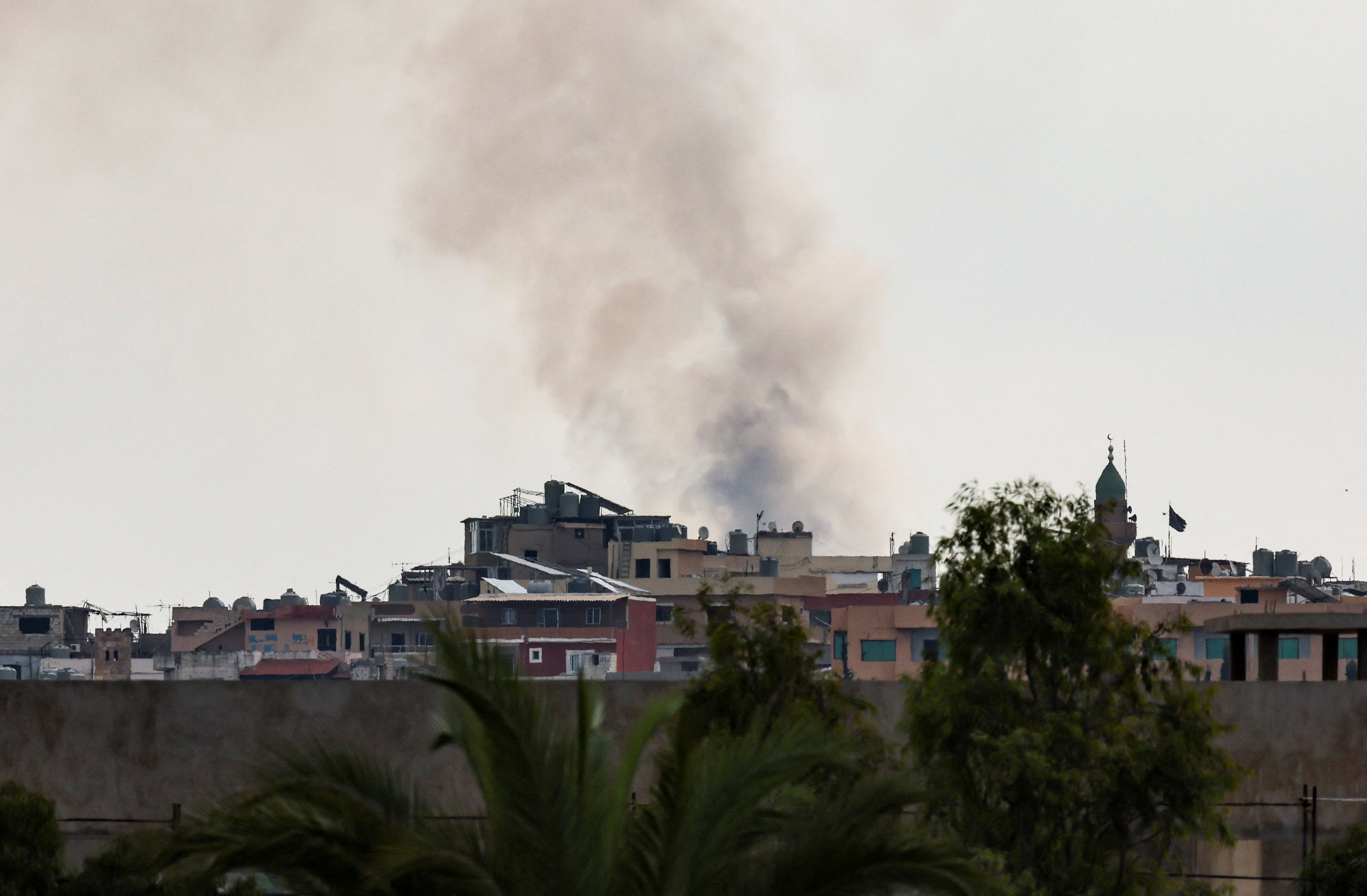 Smoke billows amid the ongoing hostilities between Hezbollah and Israeli forces, as seen from Tyre, southern Lebanon