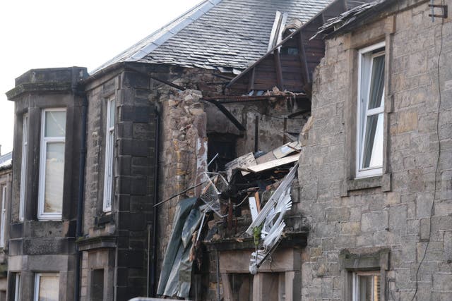 The scene at a block of flats at Kellie Place in Alloa, Clackmannanshire, after an explosion ripped through the property on Sunday leaving one man dead and several others injured (Andrew Milligan/PA)