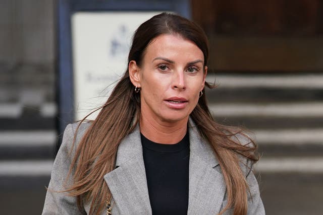 <p>Coleen Rooney leaves the Royal Courts of Justice in 2022 (Yui Mok/PA)</p>